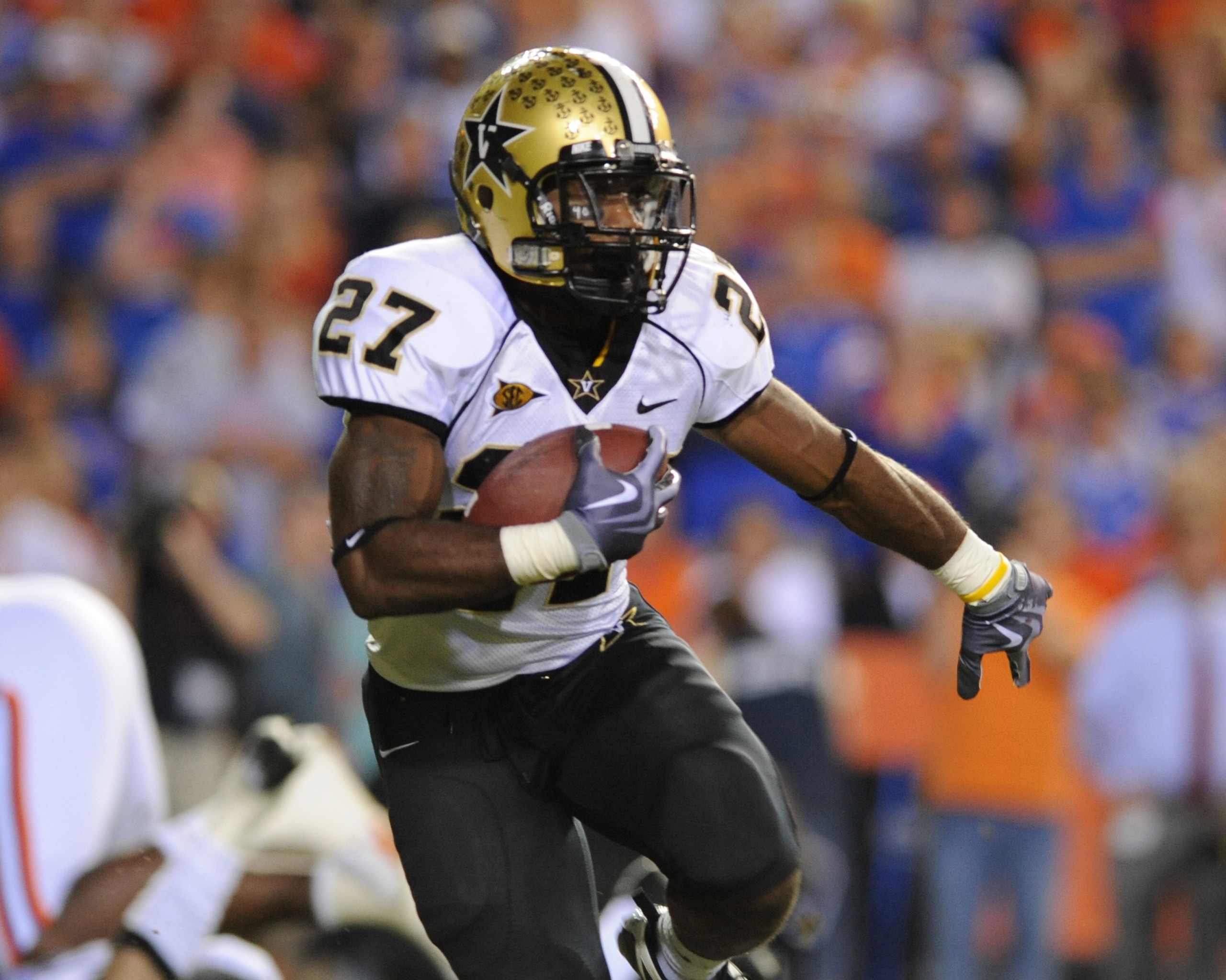 GAINESVILLE, FL - NOVEMBER 7: Running back Warren Norman #27 of the Vanderbilt Commodores rushes upfield against the Florida Gators on November 7, 2009 at Ben Hill Griffin Stadium in Gainesville, Florida.  (Photo by Al Messerschmidt/Getty Images)