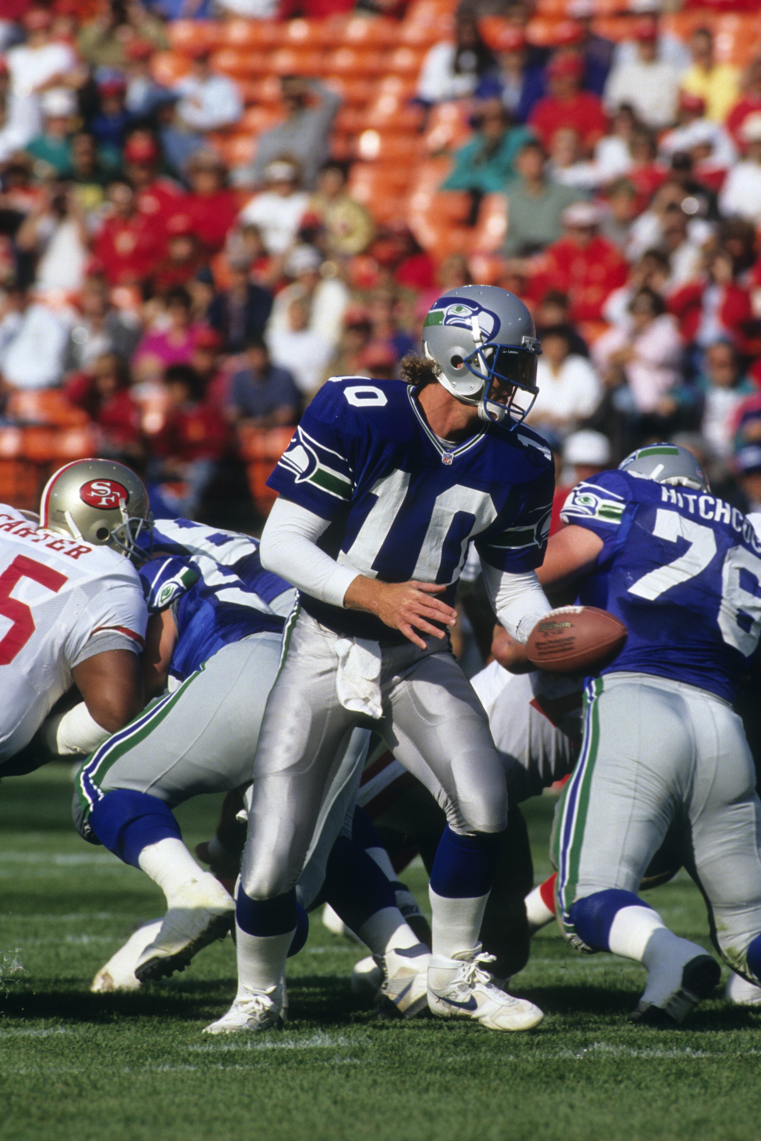 SAN FRANCISCO, CA - AUGUST 28: Quarterback Dan McGwire #10 of the Seattle Seahawks looks to hand off the ball during the exhibition game against the San Francisco 49ers at Candlestick Park on August 28, 1992 in San Francisco, California. The 49ers won 2 SAN FRANCISCO, CA - AUGUST 28: Quarterback Dan McGwire #10 of the Seattle Seahawks looks to hand off the ball during the exhibition game against the San Francisco 49ers at Candlestick Park on August 28, 1992 in San Francisco, California. The 49ers won 2