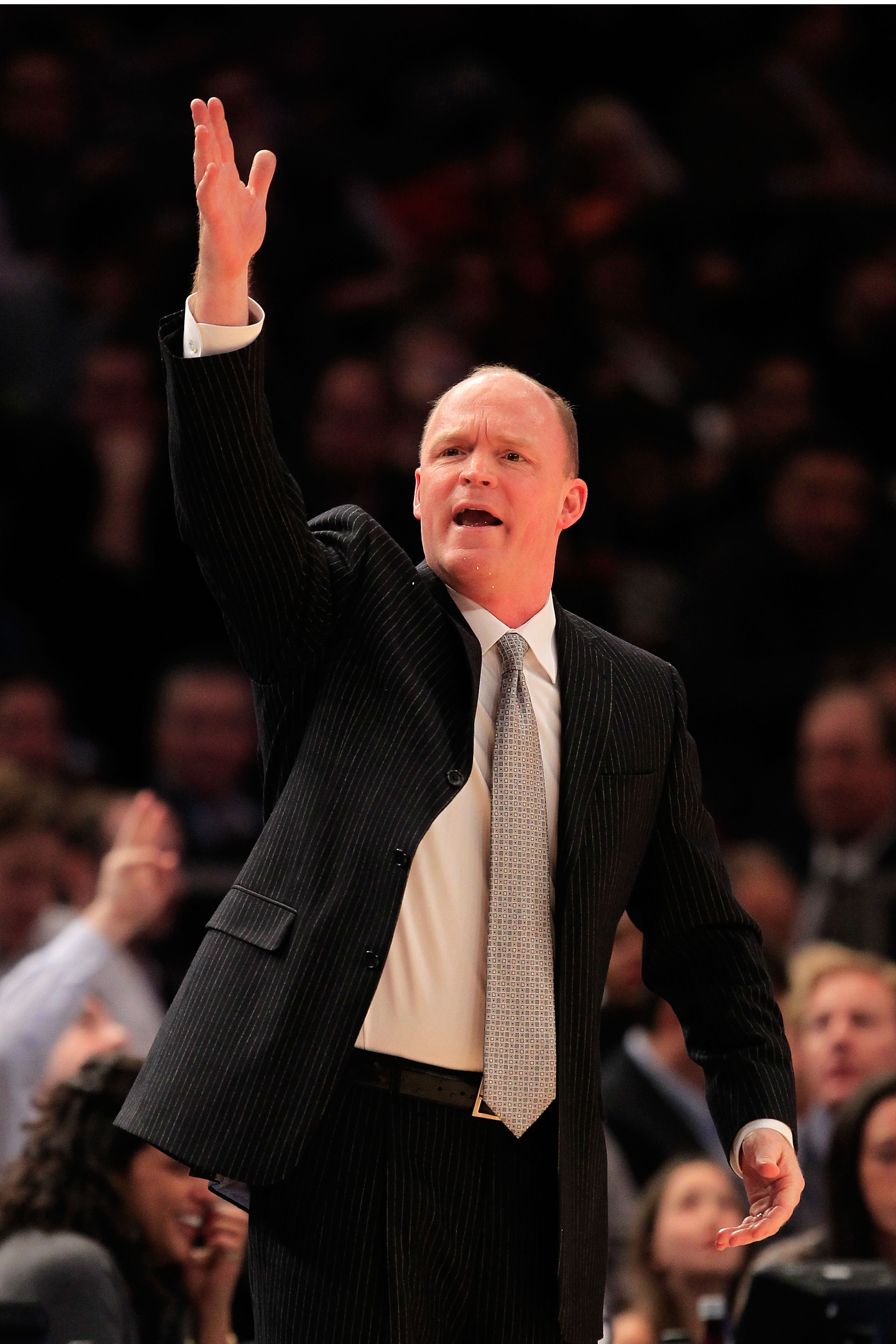NEW YORK, NY - FEBRUARY 23:  Head coach Scott Skiles of the Milwaukee Bucks gestures from the bench against the New York Knicks at Madison Square Garden on February 23, 2011 in New York City. NOTE TO USER: User expressly acknowledges and agrees that, by d
