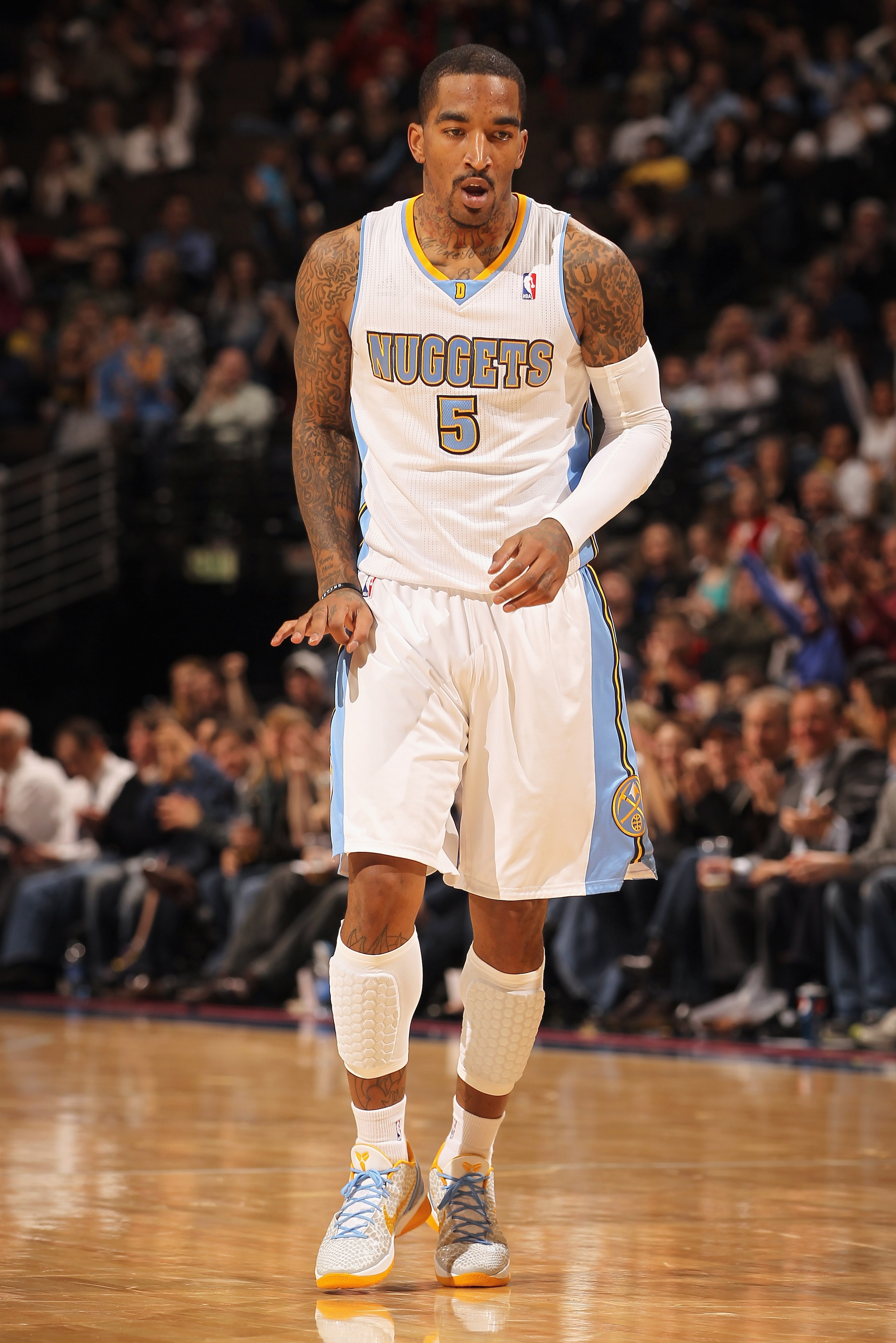 DENVER, CO - FEBRUARY 28:  J.R. Smith #5 of the Denver Nuggets gestures after scoring a three point basket against the Atlanta Hawks during NBA action at the Pepsi Center on February 28, 2011 in Denver, Colorado. The Nuggets deafeated the Hawks 100-90. NO