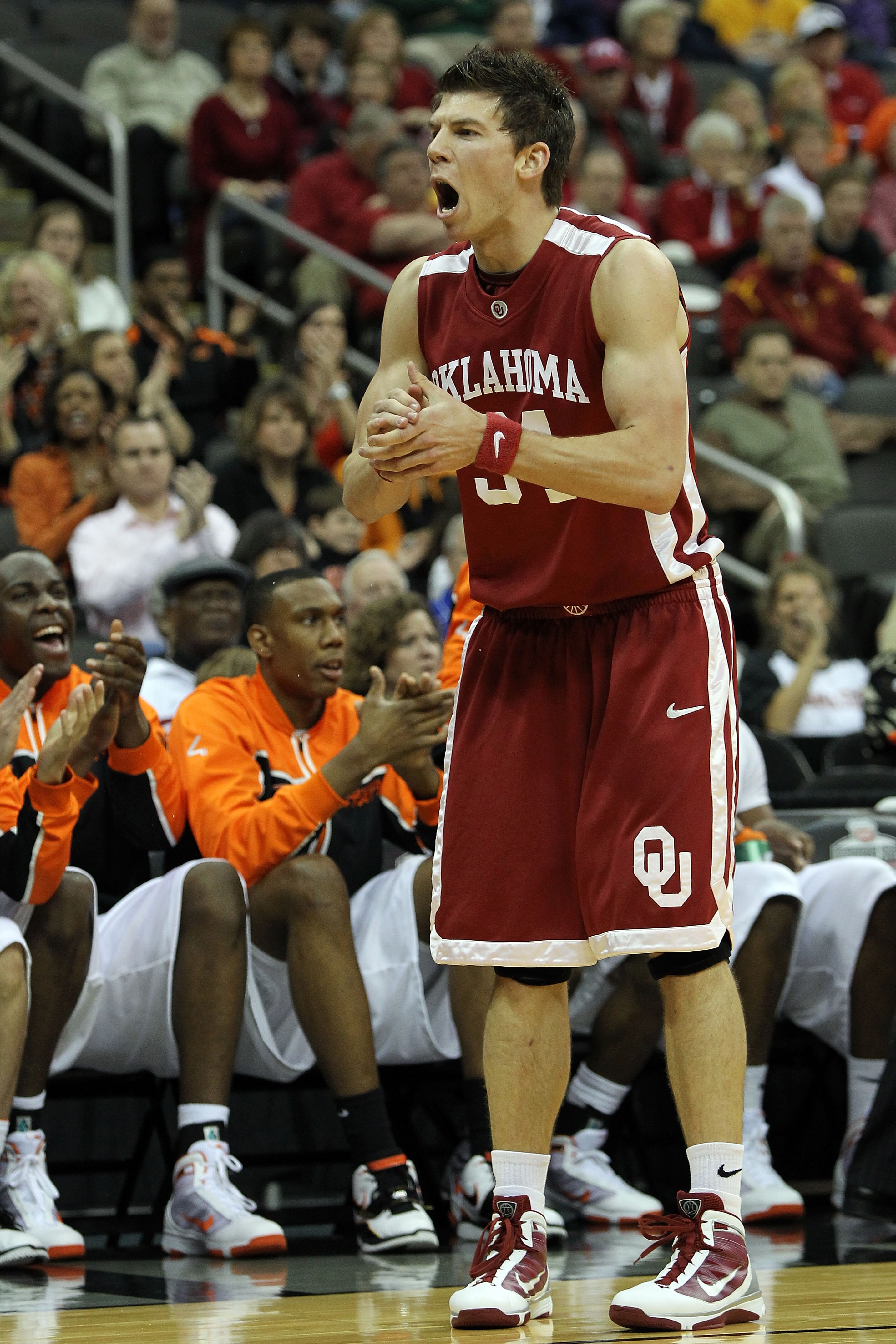 KANSAS CITY, MO - MARCH 10:  Cade Davis #34 of the Oklahoma Sooners reacts in the first half against the Oklahoma State Cowboys during the first round game of the 2010 Phillips 66 Big 12 Men's Basketball Tournament at the Sprint Center on March 10, 2010 i