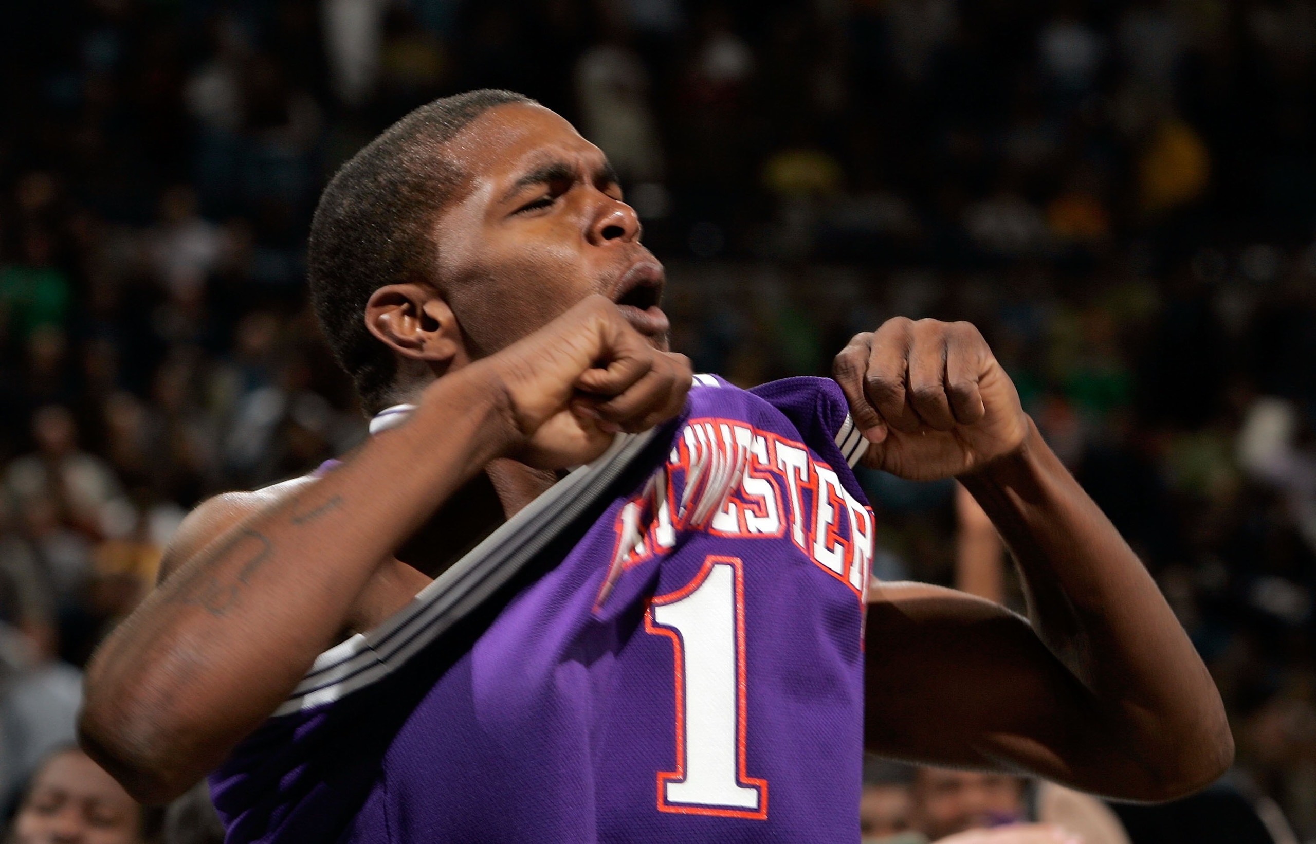 AUBURN HILLS, MI - MARCH 17:  Jermaine Spencer #1 of the Northwestern State Demons celebrates the 64-63 upset win over the Iowa Hawkeyes in the First Round of the 2006 NCAA Men's Basketball Tournament at The Palace of Auburn Hills on March 17, 2006 in Aub
