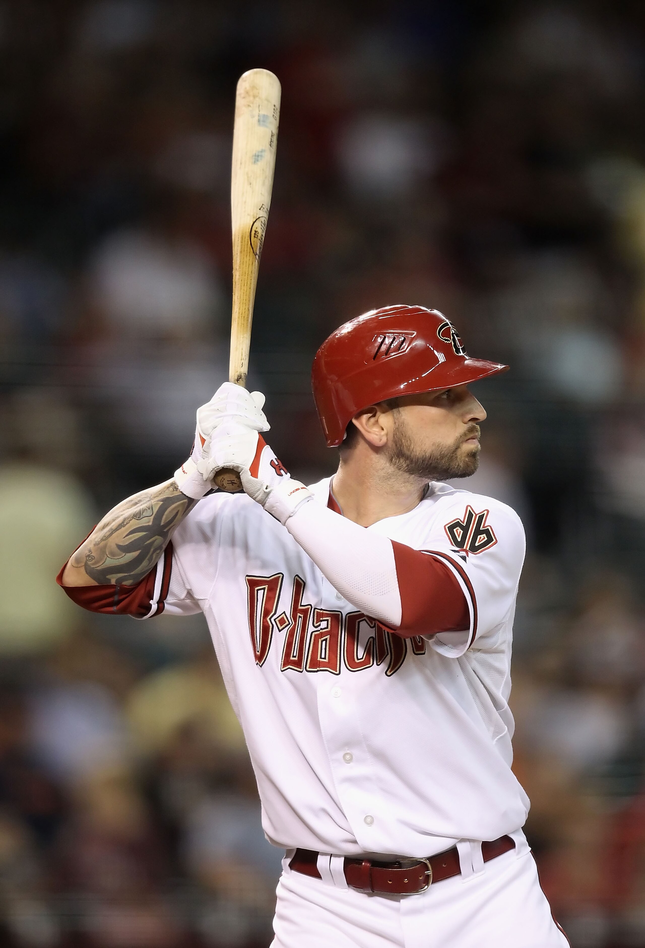 PHOENIX - SEPTEMBER 21:  Ryan Roberts #14 of the Arizona Diamondbacks bats against the Colorado Rockies during the Major League Baseball game at Chase Field on September 21, 2010 in Phoenix, Arizona.  (Photo by Christian Petersen/Getty Images)