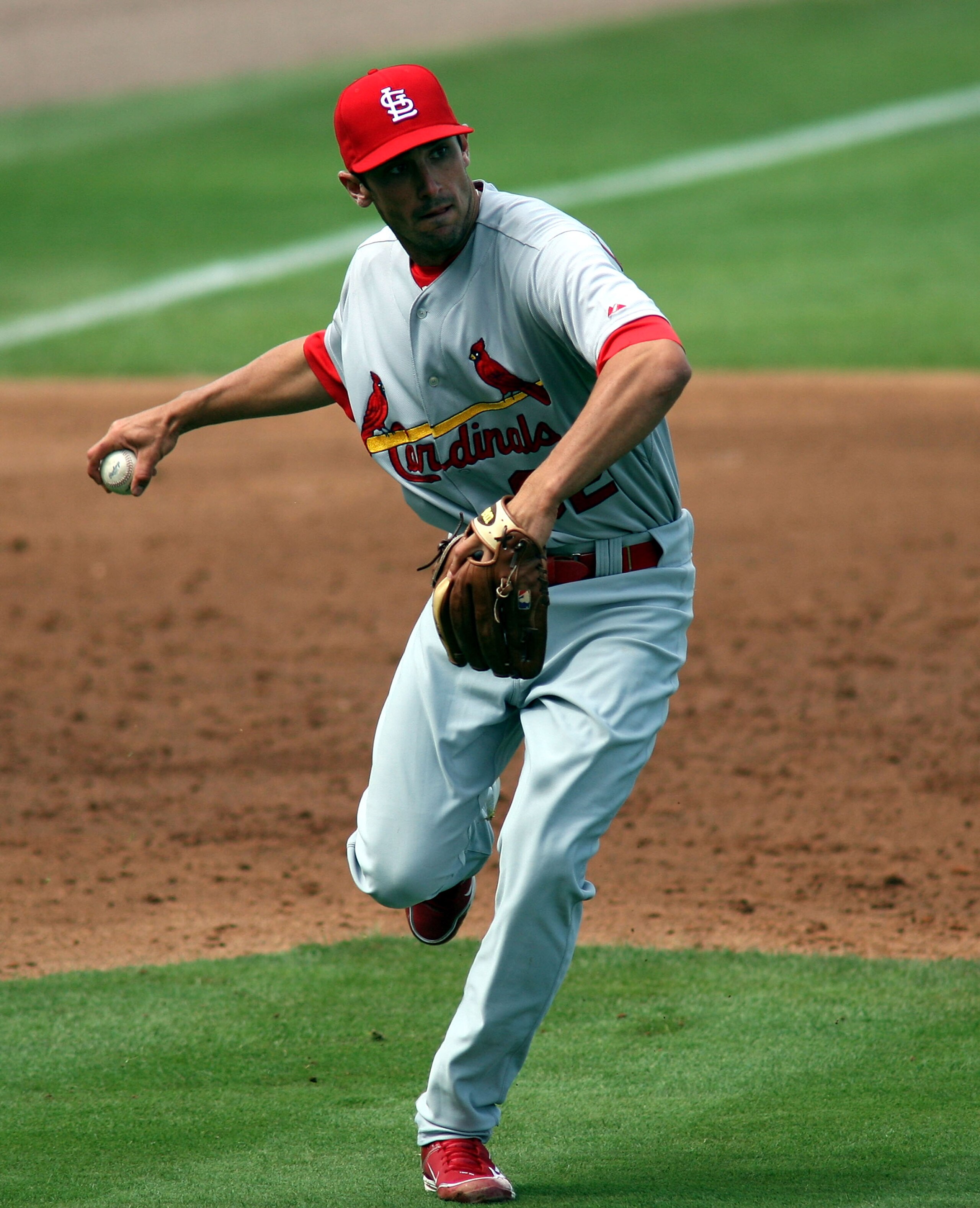 PORT ST. LUCIE, FL - MARCH 03: Third baseman Matt Carpenter #32 of the St. Louis Cardinals plays the field against the New York Mets at Digital Domain Park on March 3, 2011 in Port St. Lucie, Florida.  (Photo by Marc Serota/Getty Images)