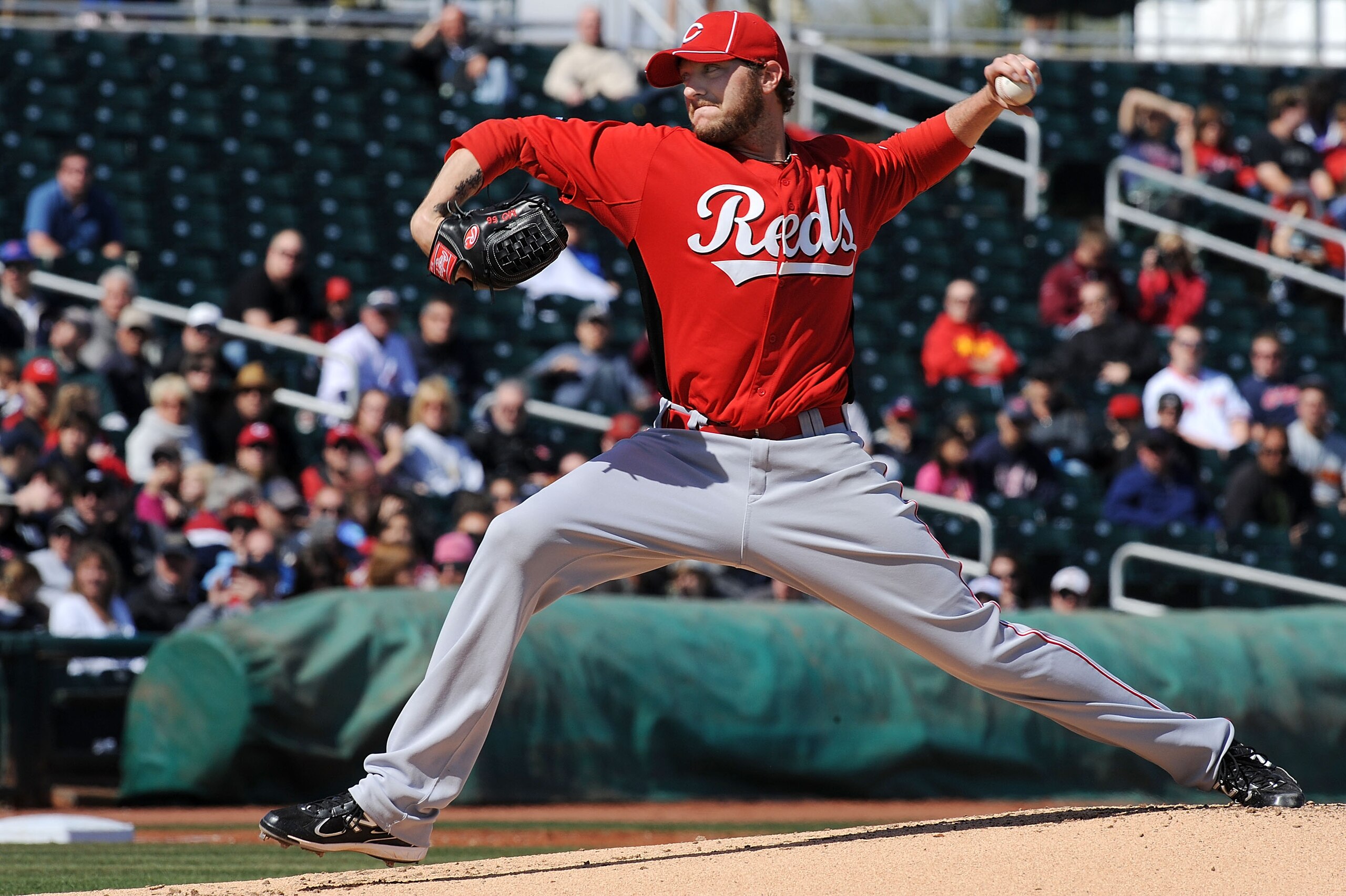 GOODYEAR, AZ - FEBRUARY 27:  Matt Maloney #56 of the Cincinnati Reds delivers a pitch against the Cleveland Indians at Goodyear Ballpark on February 27, 2011 in Goodyear, Arizona.  (Photo by Norm Hall/Getty Images)