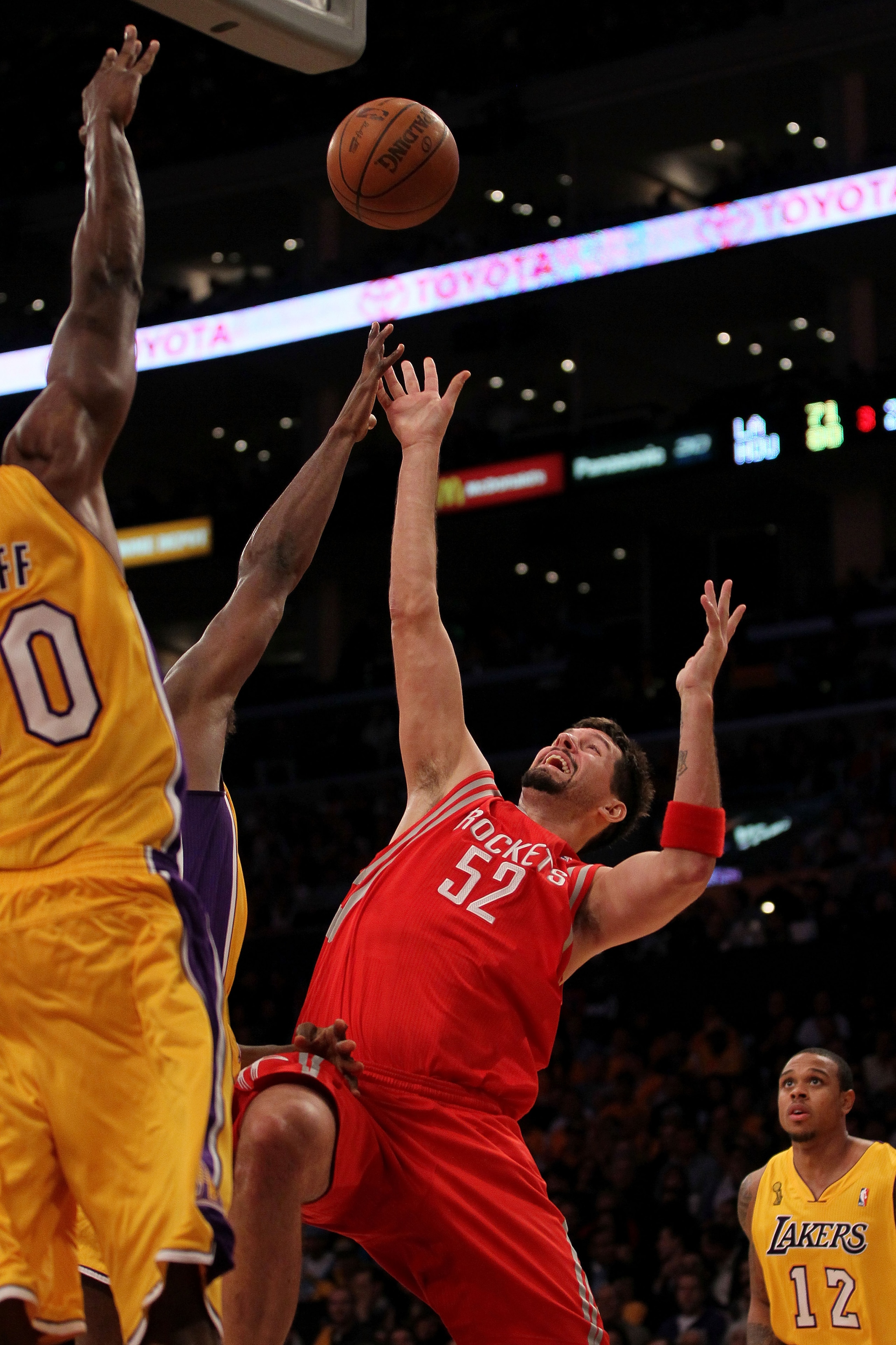 LOS ANGELES, CA - OCTOBER 26:  Brad Miller #52 of the Houston Rockets takes a shot against the Los Angeles Lakers during their game at Staples Center on October 26, 2010 in Los Angeles, California. NOTE TO USER: User expressly acknowledges and agrees that
