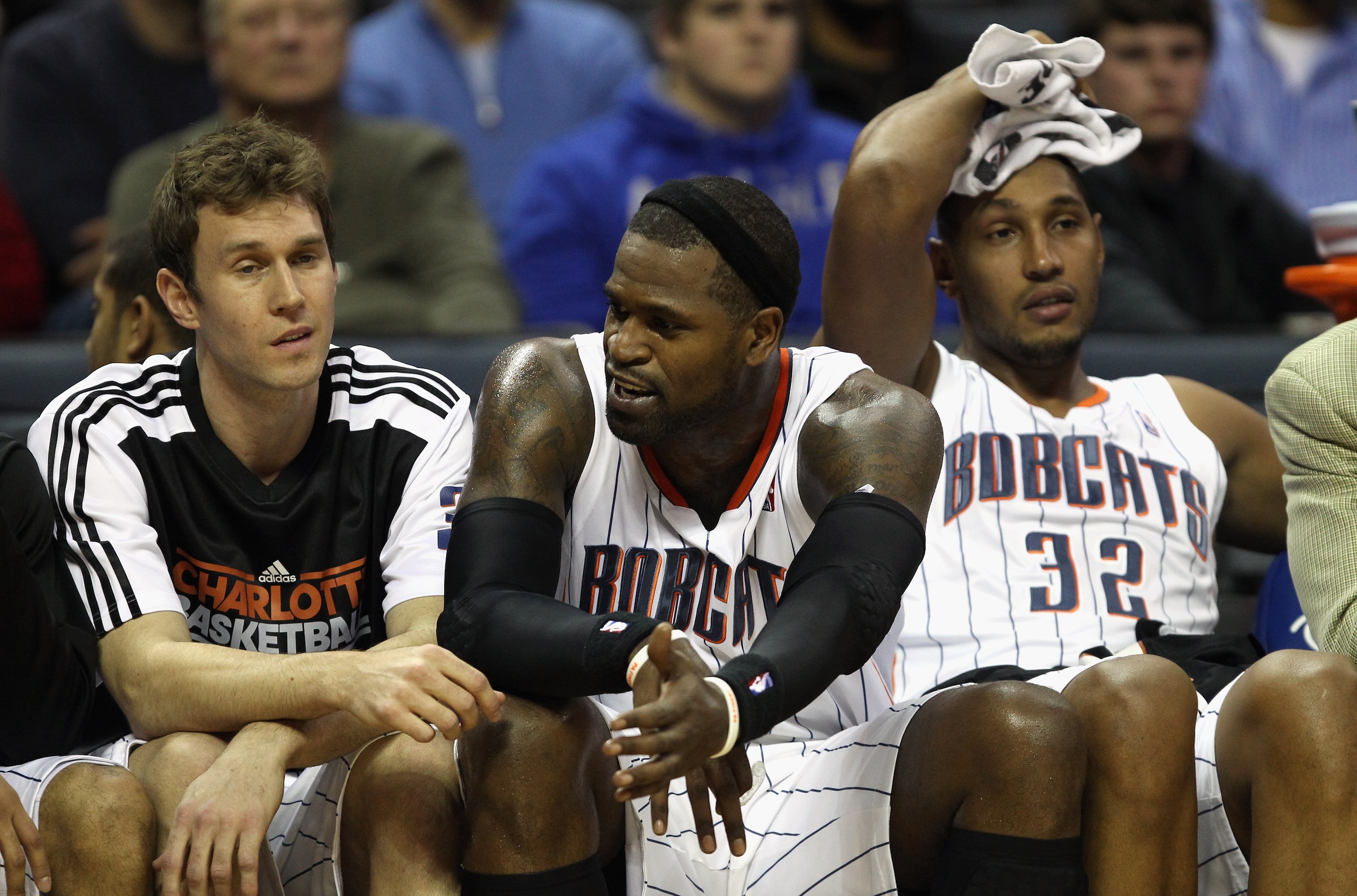 CHARLOTTE, NC - DECEMBER 21:  Teammates Matt Carroll #33, Stephen Jackson #1 and Boris Diaw #32 of the Charlotte Bobcats sit on the bench during their 99-81 loss to the Oklahoma City Thunder at Time Warner Cable Arena on December 21, 2010 in Charlotte, No