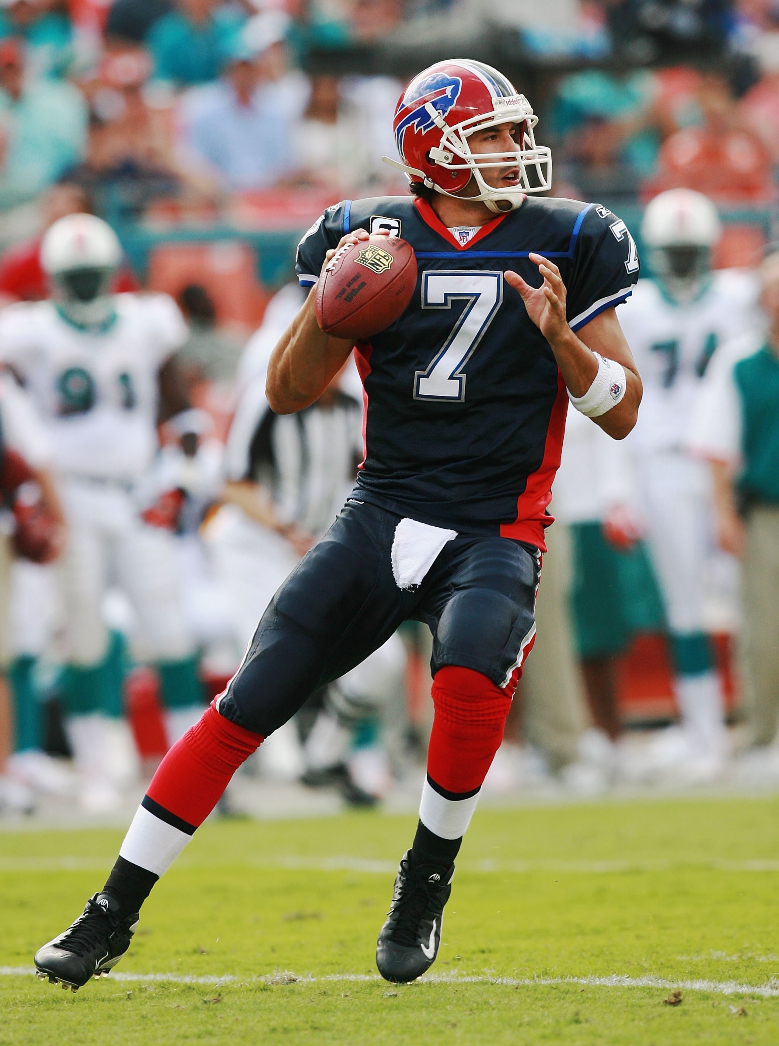 MIAMI - NOVEMBER 11: Quarterback J.P. Losman #7 of the Buffalo Bills drops back to pass against the Miami Dolphins at Dolphin Stadium on November 11, 2007 in Miami, Florida. The Bills defeated the Dolphins 13-10. (Photo by Doug Benc/Getty Images) MIAMI - NOVEMBER 11: Quarterback J.P. Losman #7 of the Buffalo Bills drops back to pass against the Miami Dolphins at Dolphin Stadium on November 11, 2007 in Miami, Florida. The Bills defeated the Dolphins 13-10. (Photo by Doug Benc/Getty Images)