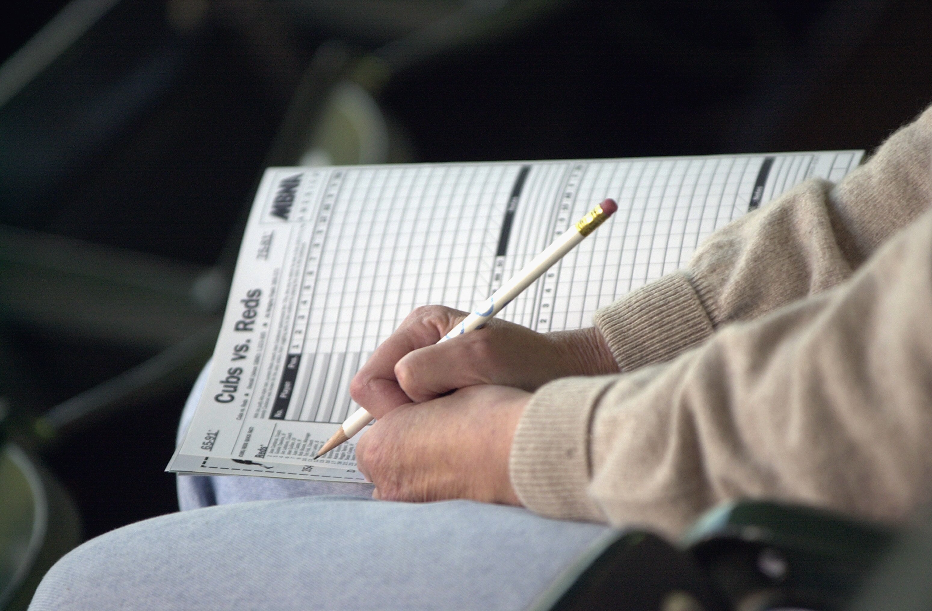 CHICAG0 - SEPTEMBER 24:  Detail of a fan's scorecard before the MLB game between the Cincinnati Reds and the Chicago Cubs on September 24, 2002 at Wrigley Field in Chicago, Illinois.  The Reds shut out the Cubs 1-0. (Photo by Jonathan Daniel/Getty Images)