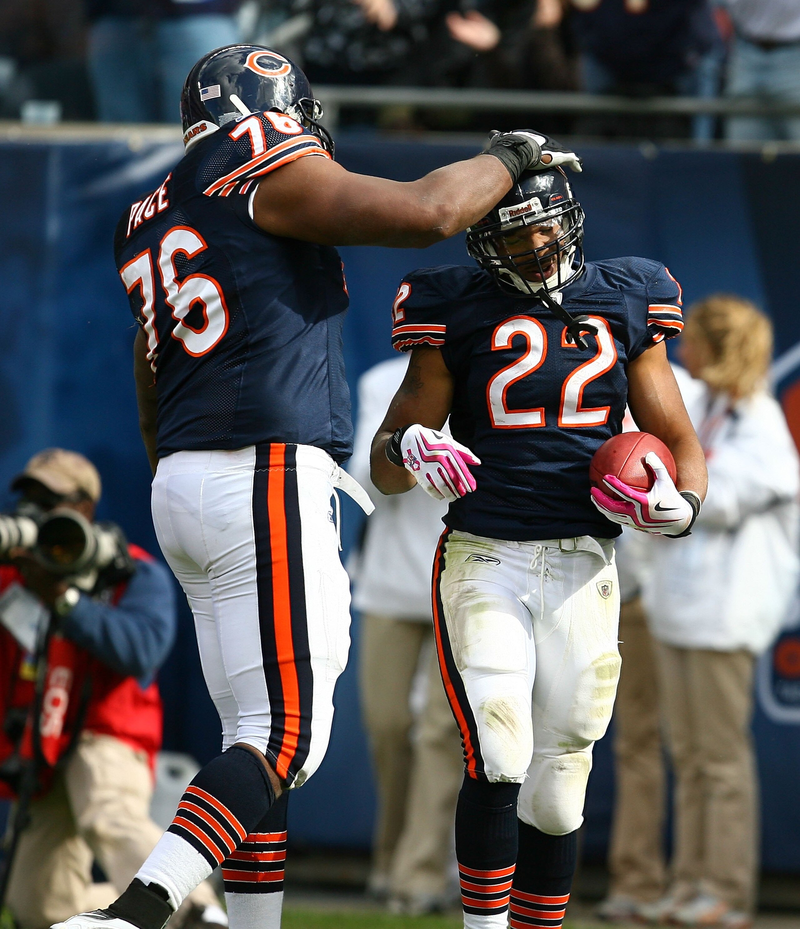 CHICAGO - OCTOBER 04: Matt Forte #22 of the Chicago Bears is congratulated by teammate Orlando Pace #76 after scoring a touchdown against the Detroit Lions on October 4, 2009 at Soldier Field in Chicago, Illinois. The Bears defeated the Lions 48-24.  (Pho