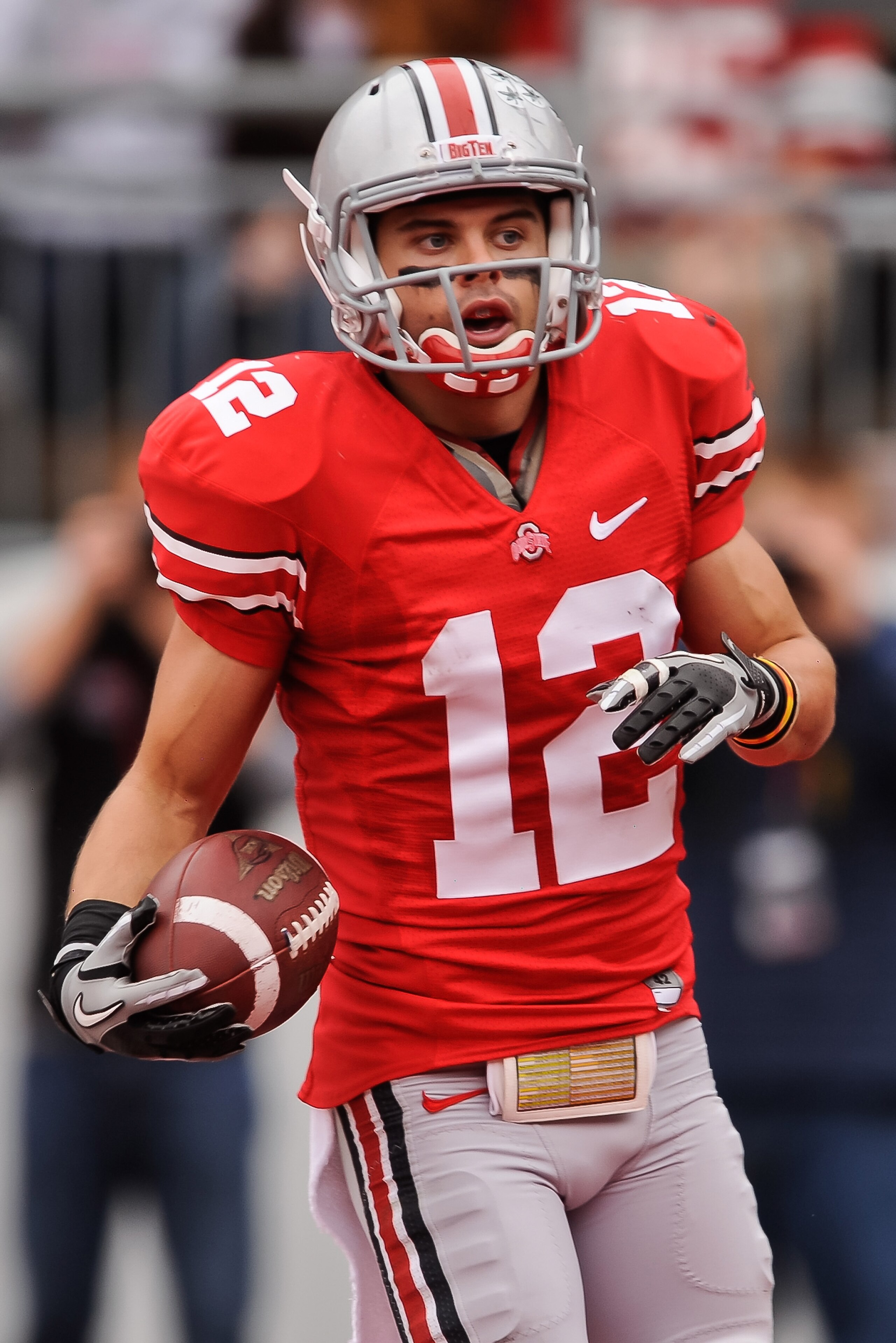 COLUMBUS, OH - OCTOBER 23: Dane Sanzenbacher #12 of the Ohio State Buckeyes scores a touchdown against the Purdue Boilermakers at Ohio Stadium on October 23, 2010 in Columbus, Ohio. (Photo by Jamie Sabau/Getty Images) COLUMBUS, OH - OCTOBER 23: Dane Sanzenbacher #12 of the Ohio State Buckeyes scores a touchdown against the Purdue Boilermakers at Ohio Stadium on October 23, 2010 in Columbus, Ohio. (Photo by Jamie Sabau/Getty Images)