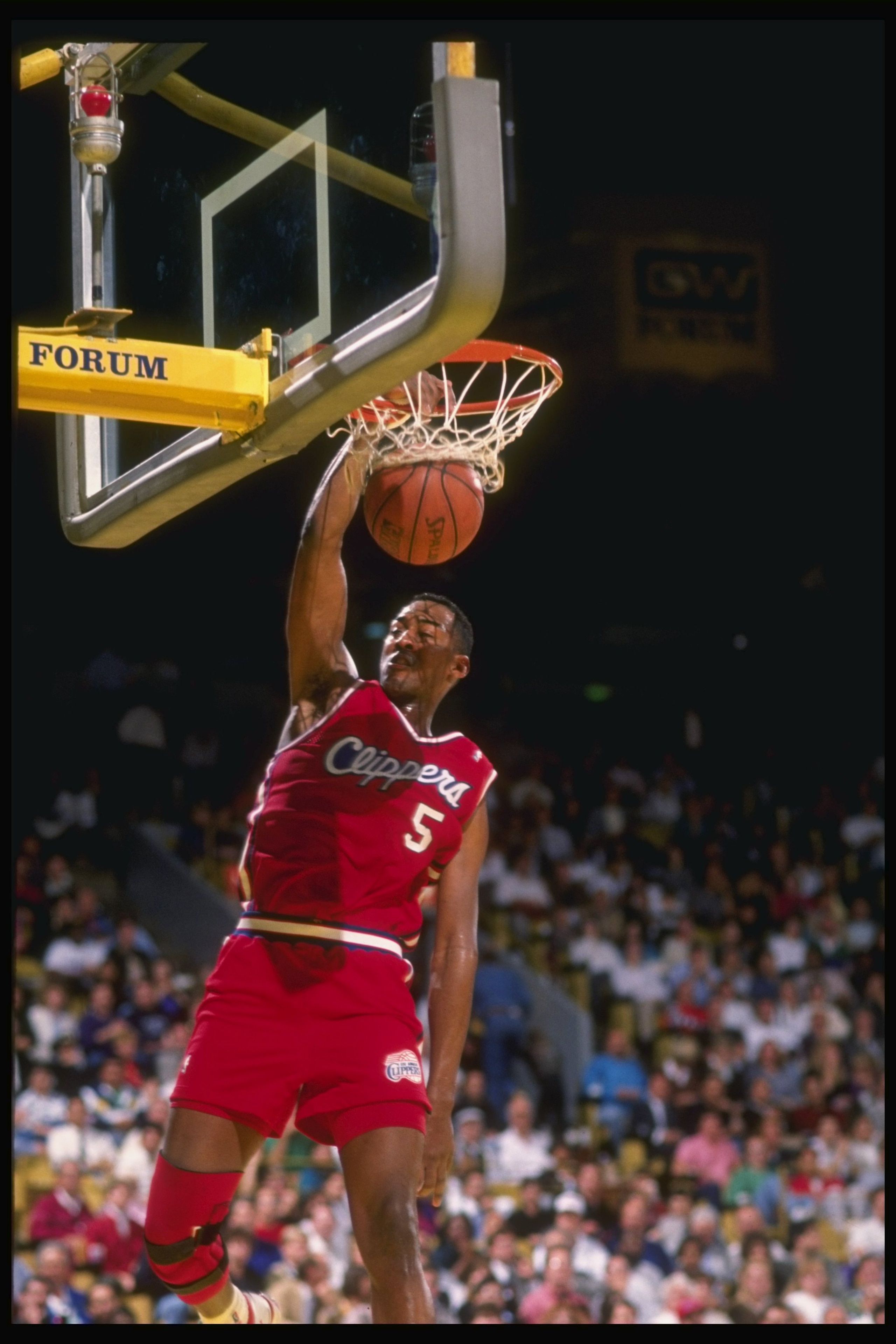 1990-1991:  Forward Danny Manning of the Los Angeles Clippers slam dunks the ball during a game versus the Los Angeles Lakers at the Great Western Forum in Inglewood, California. Mandatory Credit: Ken Levine  /Allsport