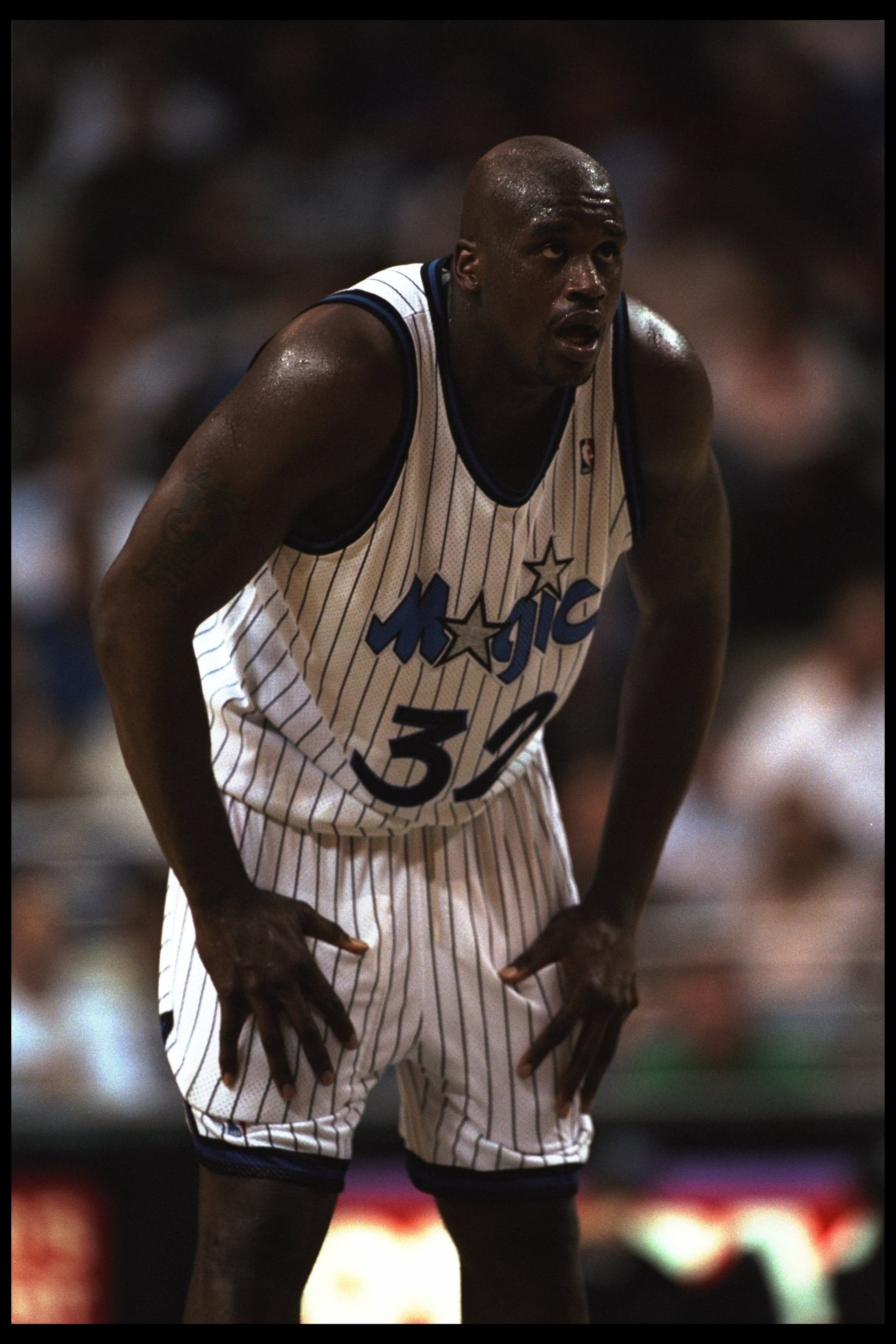 20 Feb 1996: Center Shaquille O'Neal of the Orlando Magic looks on during a game against the Philadelphia 76ers played at the Orlando Arena in Orlando, Florida. The Magic won the game, 123-104.