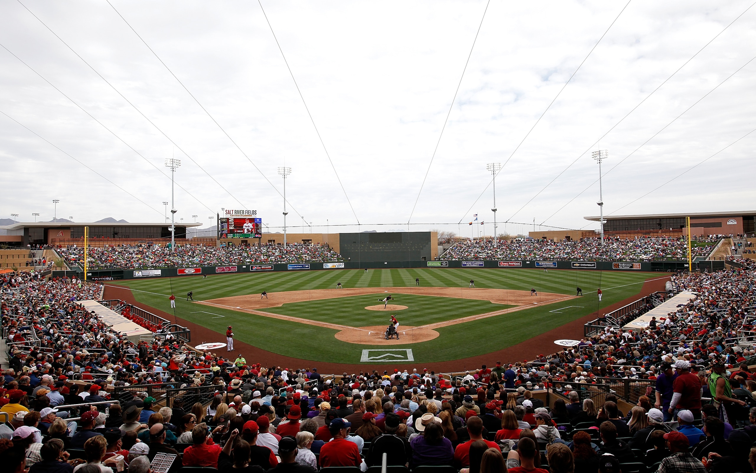 SCOTTSDALE, AZ - FEBRUARY 26:  Fans gather to watch the inaugural game at the new Salt River Fields between the Colorado Rockies and the Arizona Diamondbacks at Salt River Fields on February 26, 2011 in Scottsdale, Arizona..  (Photo by Jonathan Ferrey/Get