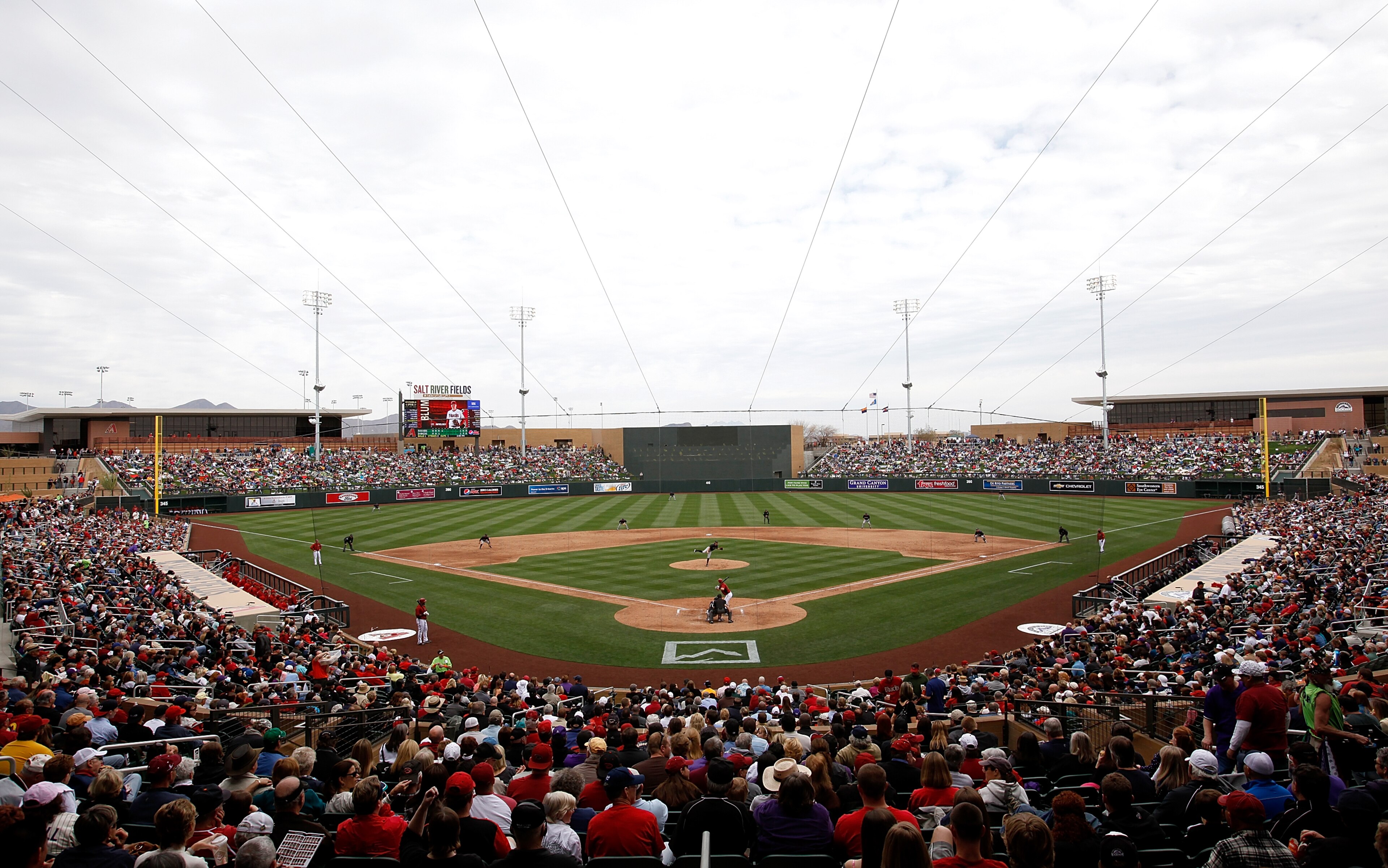 SCOTTSDALE, AZ - FEBRUARY 26:  Fans gather to watch the inaugural game at the new Salt River Fields between the Colorado Rockies and the Arizona Diamondbacks at Salt River Fields on February 26, 2011 in Scottsdale, Arizona..  (Photo by Jonathan Ferrey/Get