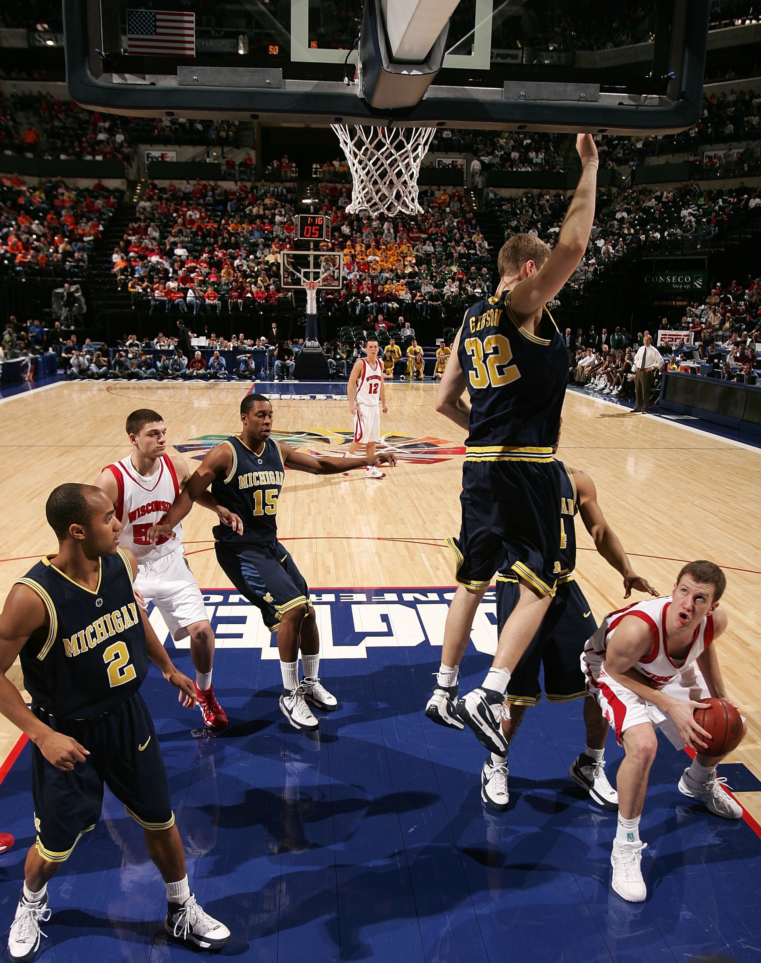 INDIANAPOLIS - MARCH 14:  Tim Jarmusz #24 of the Wisconsin Badgers looks to go up for a shot against Zack Gibson #32 of the Michigan Wolverines during the Big Ten Men's Basketball Tournament at Conseco Fieldhouse on March 14, 2008 in Indianapolis, Indiana