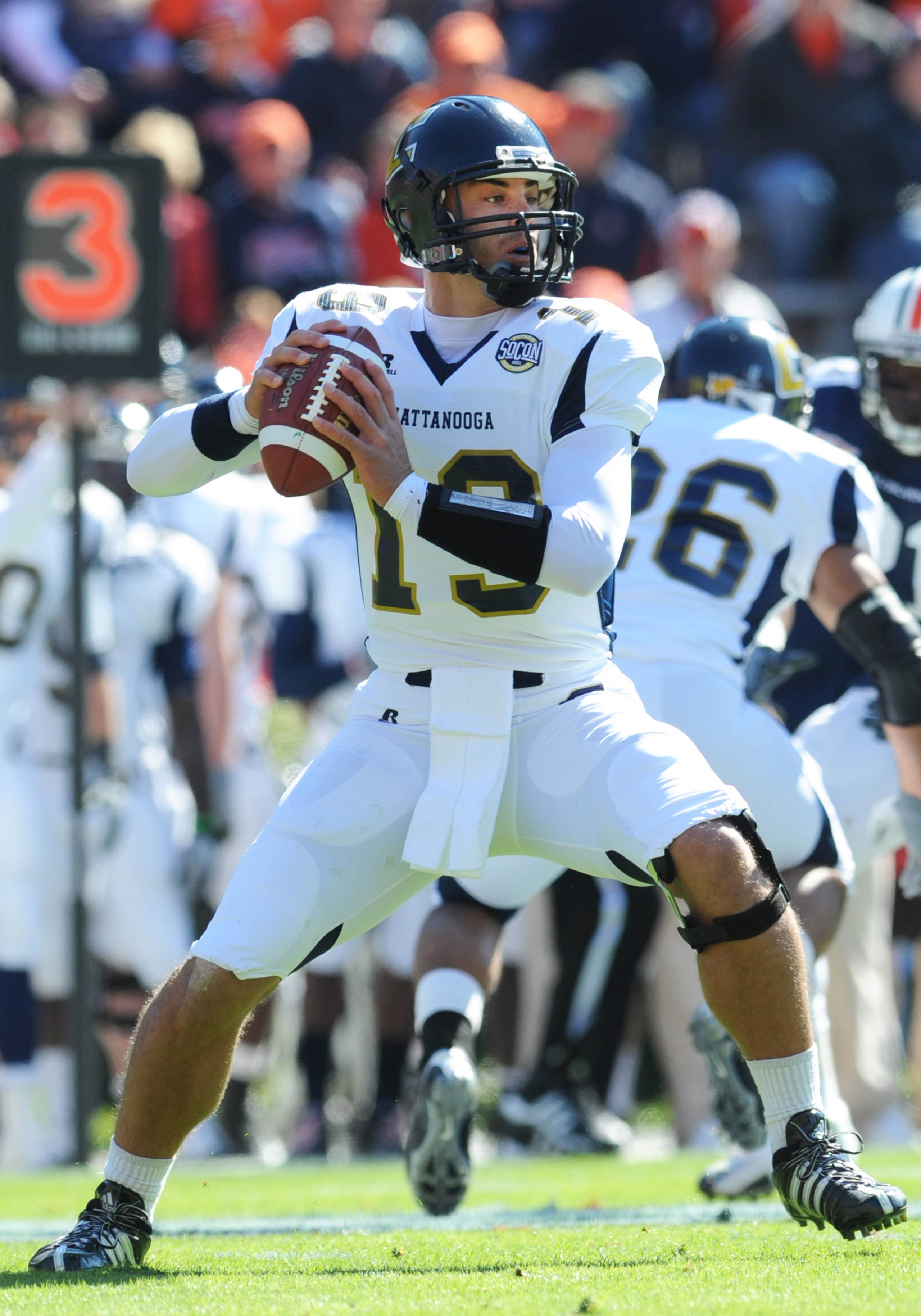 AUBURN, AL - NOVEMBER 6: Quarterback B. J. Coleman #19 of the Chattanooga Mocs sets to pass against the Auburn Tigers November 6, 2010 at Jordan-Hare Stadium in Auburn, Alabama. Auburn won 62 - 24. (Photo by Al Messerschmidt/Getty Images) AUBURN, AL - NOVEMBER 6: Quarterback B. J. Coleman #19 of the Chattanooga Mocs sets to pass against the Auburn Tigers November 6, 2010 at Jordan-Hare Stadium in Auburn, Alabama. Auburn won 62 - 24. (Photo by Al Messerschmidt/Getty Images)