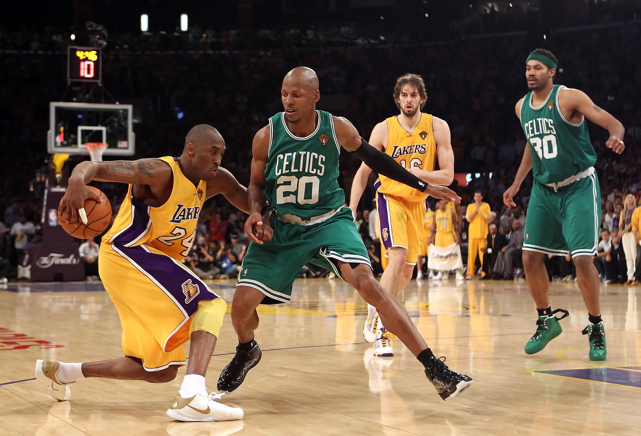 LOS ANGELES, CA - JUNE 17:  Kobe Bryant #24 of the Los Angeles Lakers handles the ball under pressure from Ray Allen #20 of the Boston Celtics in Game Seven of the 2010 NBA Finals at Staples Center on June 17, 2010 in Los Angeles, California. The Lakers d