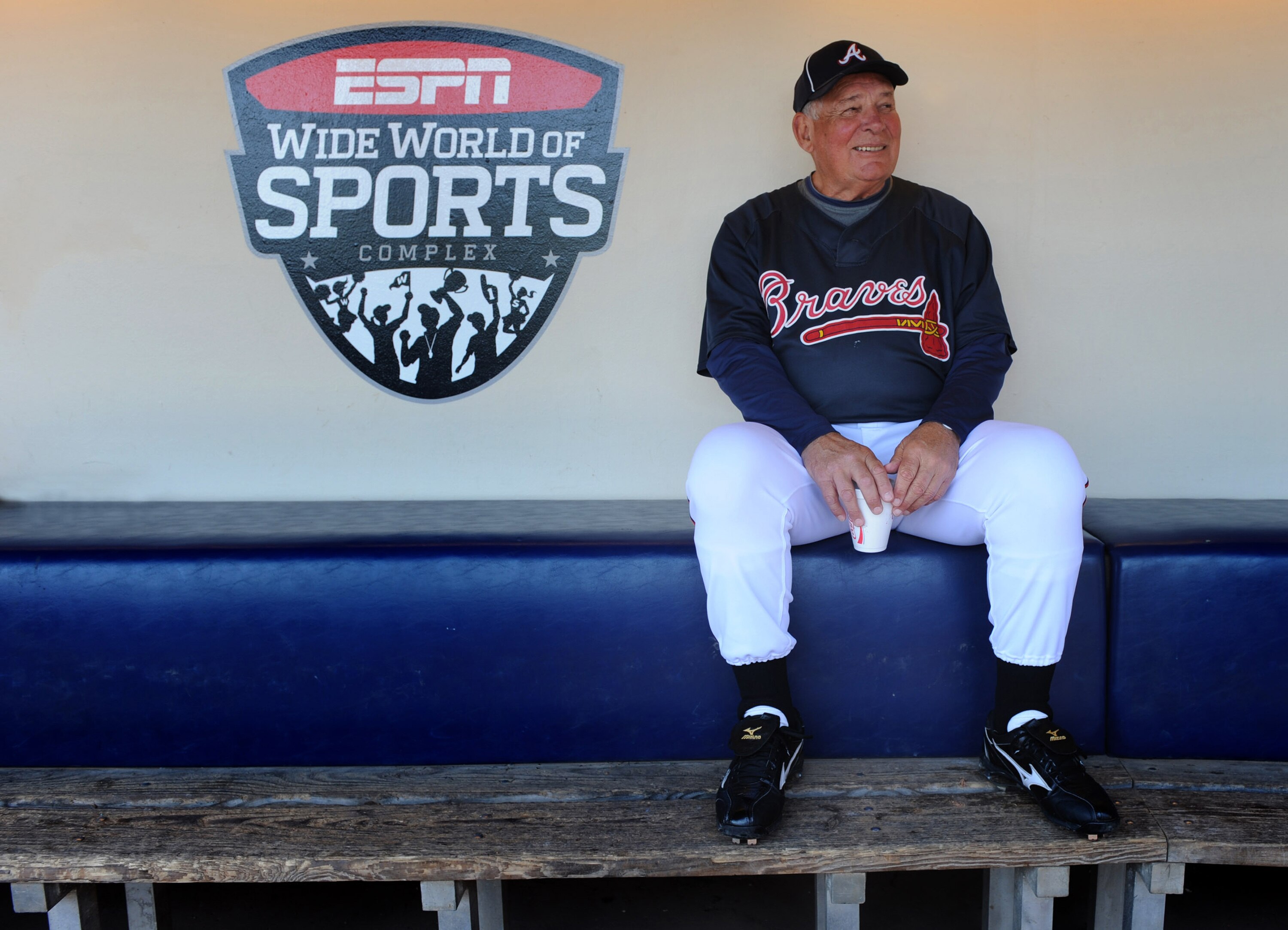 LAKE BUENA VISTA, FL - MARCH 31:  In this handout photo provided by Disney, Atlanta Braves manager Bobby Cox sits in the dugout at ESPN Wide World of Sports Complex prior to the start of his final game at the complex's baseball stadium on March 31, 2010 i