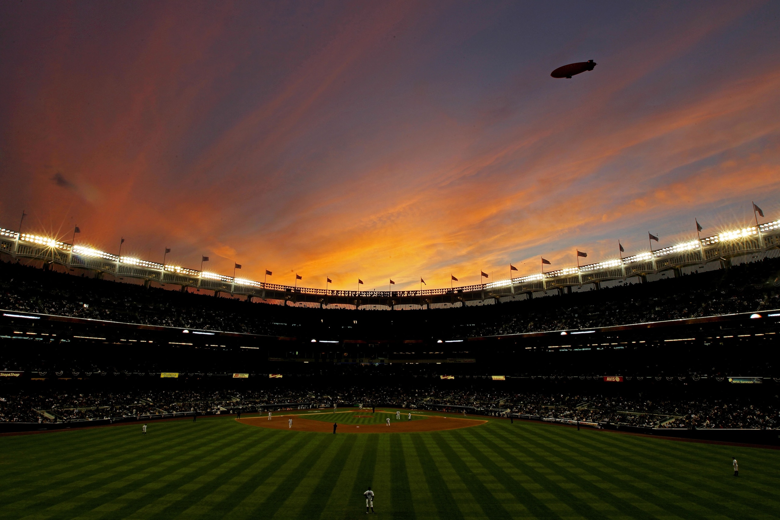 NEW YORK - OCTOBER 20:  The Conan blimp flies over Yankee stadium as the New York Yankees play against the Texas Rangers in Game Five of the ALCS during the 2010 MLB Playoffs at Yankee Stadium on October 20, 2010 in the Bronx borough of New York City.  (P
