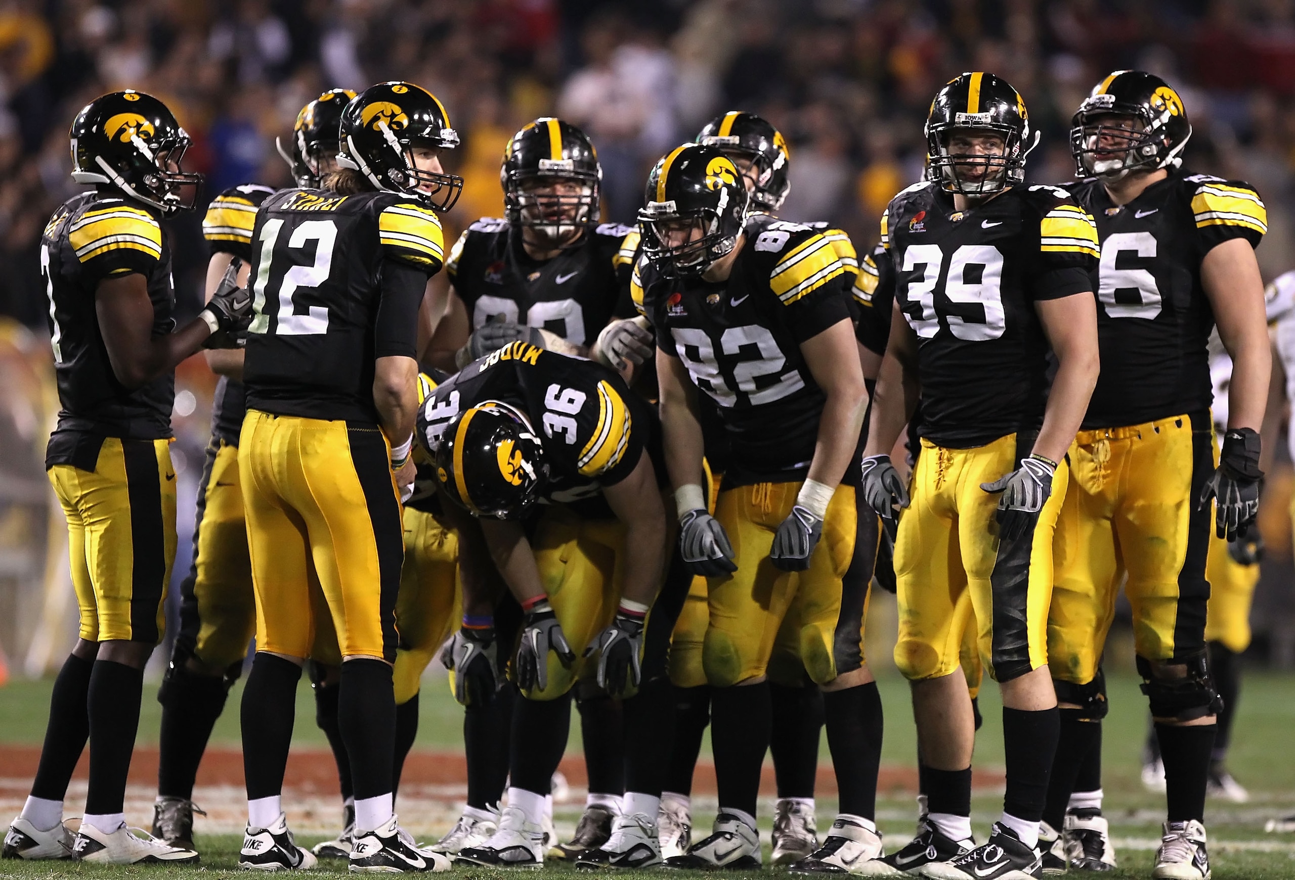 TEMPE, AZ - DECEMBER 28: Quarterback Ricky Stanzi #12 of the Iowa Hawkeyes huddles up with teammates during the Insight Bowl against the Missouri Tigers at Sun Devil Stadium on December 28, 2010 in Tempe, Arizona. The Hawkeyes defeated the Tigers 27-24. TEMPE, AZ - DECEMBER 28: Quarterback Ricky Stanzi #12 of the Iowa Hawkeyes huddles up with teammates during the Insight Bowl against the Missouri Tigers at Sun Devil Stadium on December 28, 2010 in Tempe, Arizona. The Hawkeyes defeated the Tigers 27-24.