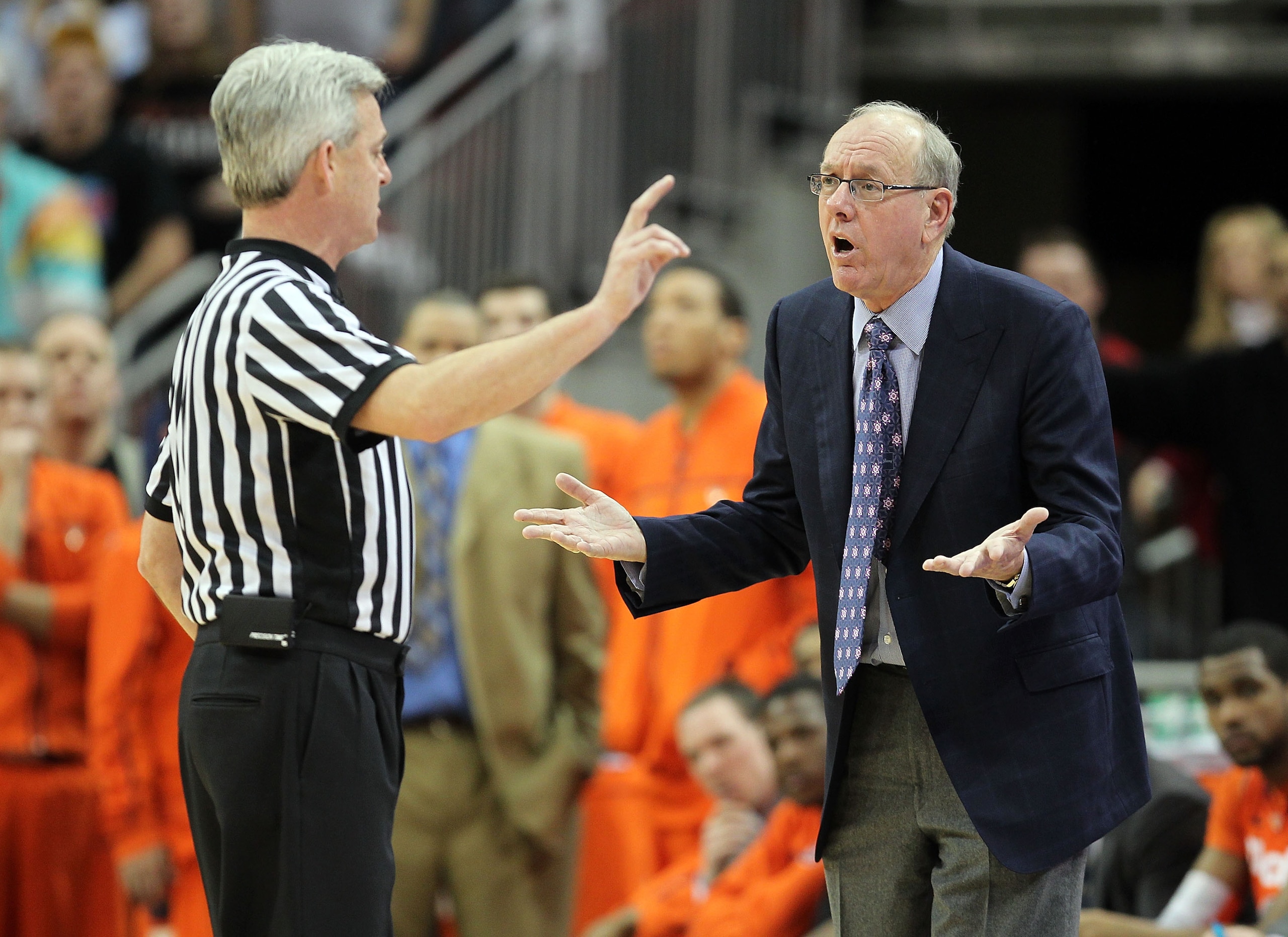 LOUISVILLE, KY - FEBRUARY 12: Jim Boeheim the Head Coach of the Syracuse Orange argues with game offical Brian O'Connell during the Big East Conference game against the Louisville Cardinals at the KFC Yum! Center on February 12, 2011 in Louisville, Kentu LOUISVILLE, KY - FEBRUARY 12: Jim Boeheim the Head Coach of the Syracuse Orange argues with game offical Brian O'Connell during the Big East Conference game against the Louisville Cardinals at the KFC Yum! Center on February 12, 2011 in Louisville, Kentu