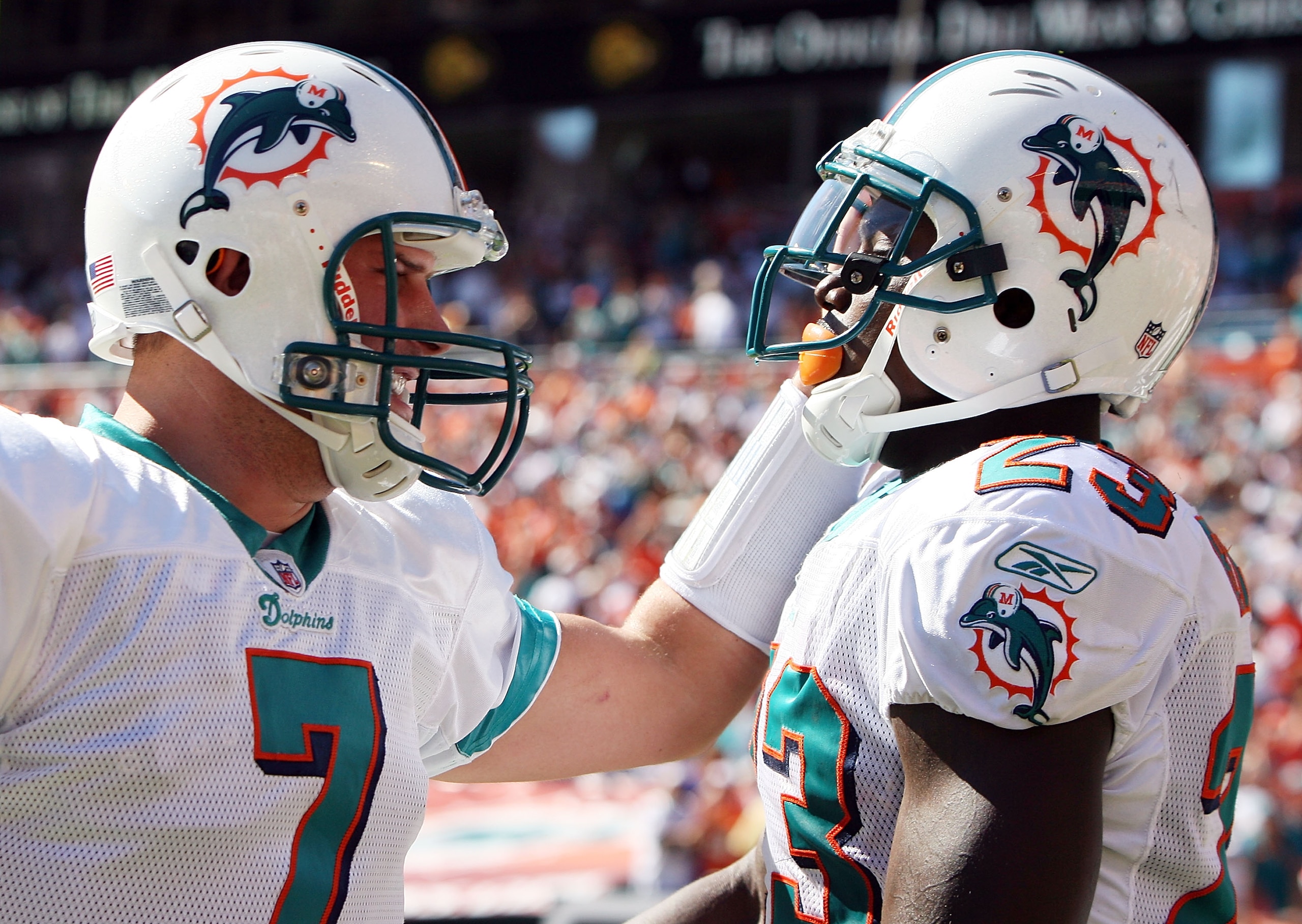 MIAMI GARDENS, FL - NOVEMBER 15:  Quarterback Chad Henne #7 and running back Ronnie Brown #23 of the Miami Dolphins celebrate after a long run against the Tampa Bay Buccaneers at Land Shark Stadium on November 15, 2009 in Miami Gardens, Florida. The Dolph