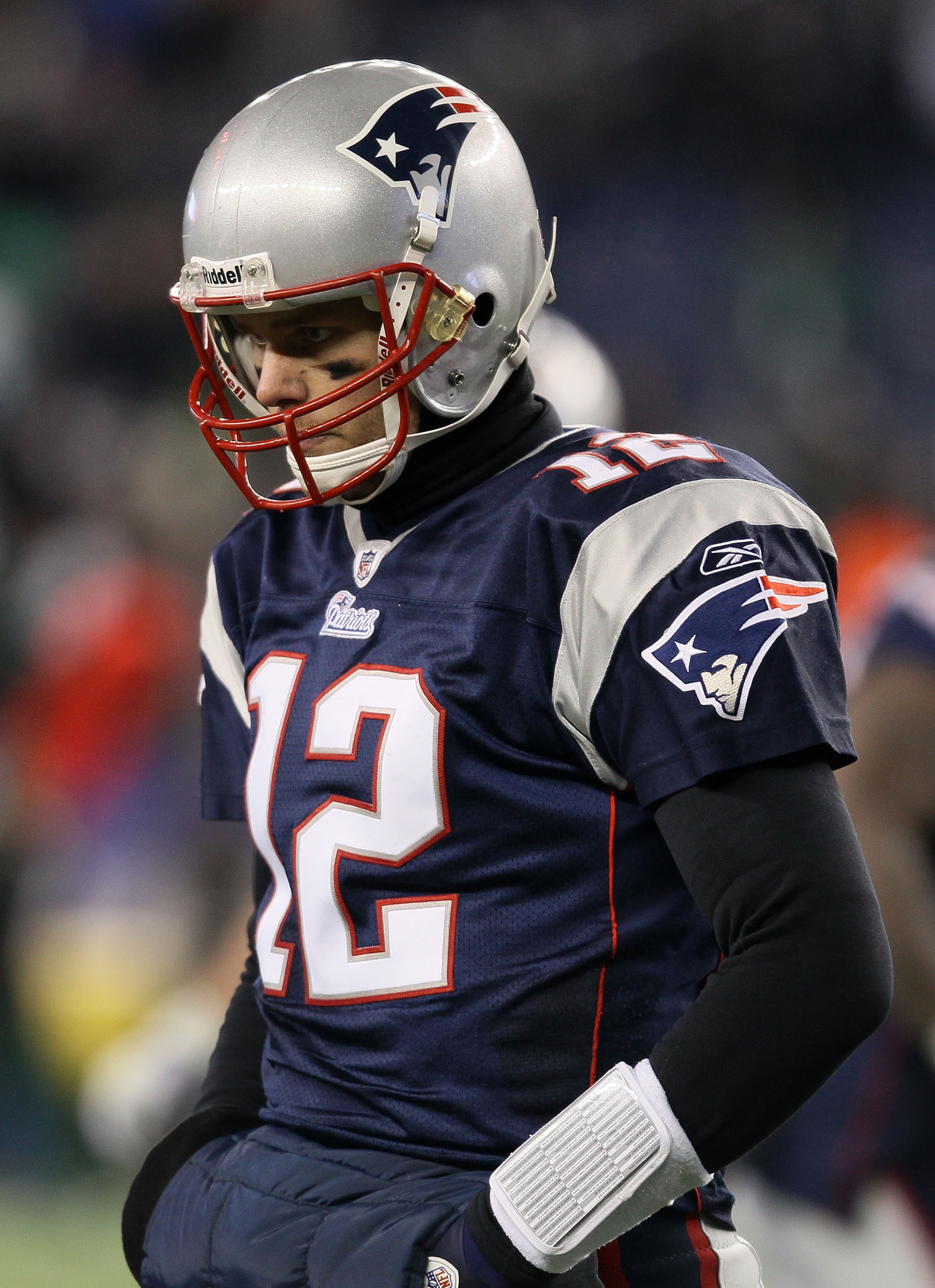 FOXBORO, MA - JANUARY 16:  Quarterback Tom Brady #12 of the New England Patriots stands on the field during their 2011 AFC divisional playoff game against the New York Jets at Gillette Stadium on January 16, 2011 in Foxboro, Massachusetts.  (Photo by Elsa