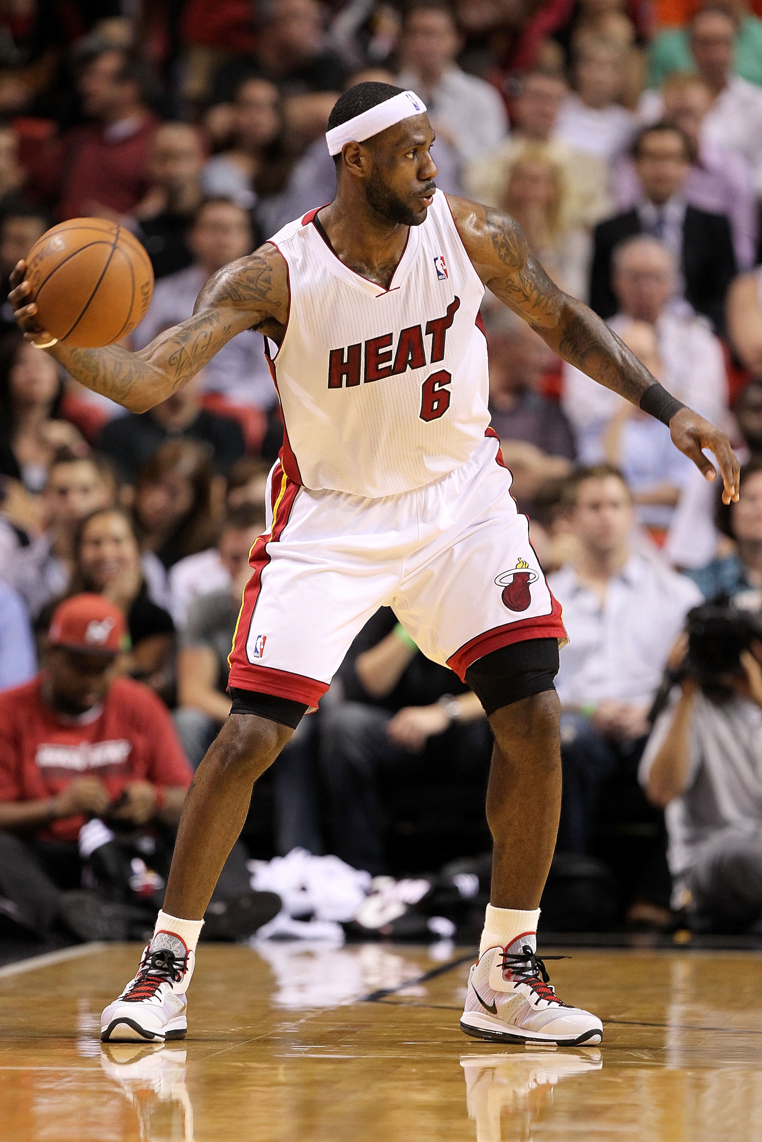 MIAMI, FL - MARCH 08: LeBron James #6 of the Miami Heat passes the ball during a game against the Portland Trail Blazers at American Airlines Arena on March 8, 2011 in Miami, Florida. NOTE TO USER: User expressly acknowledges and agrees that, by downloadi