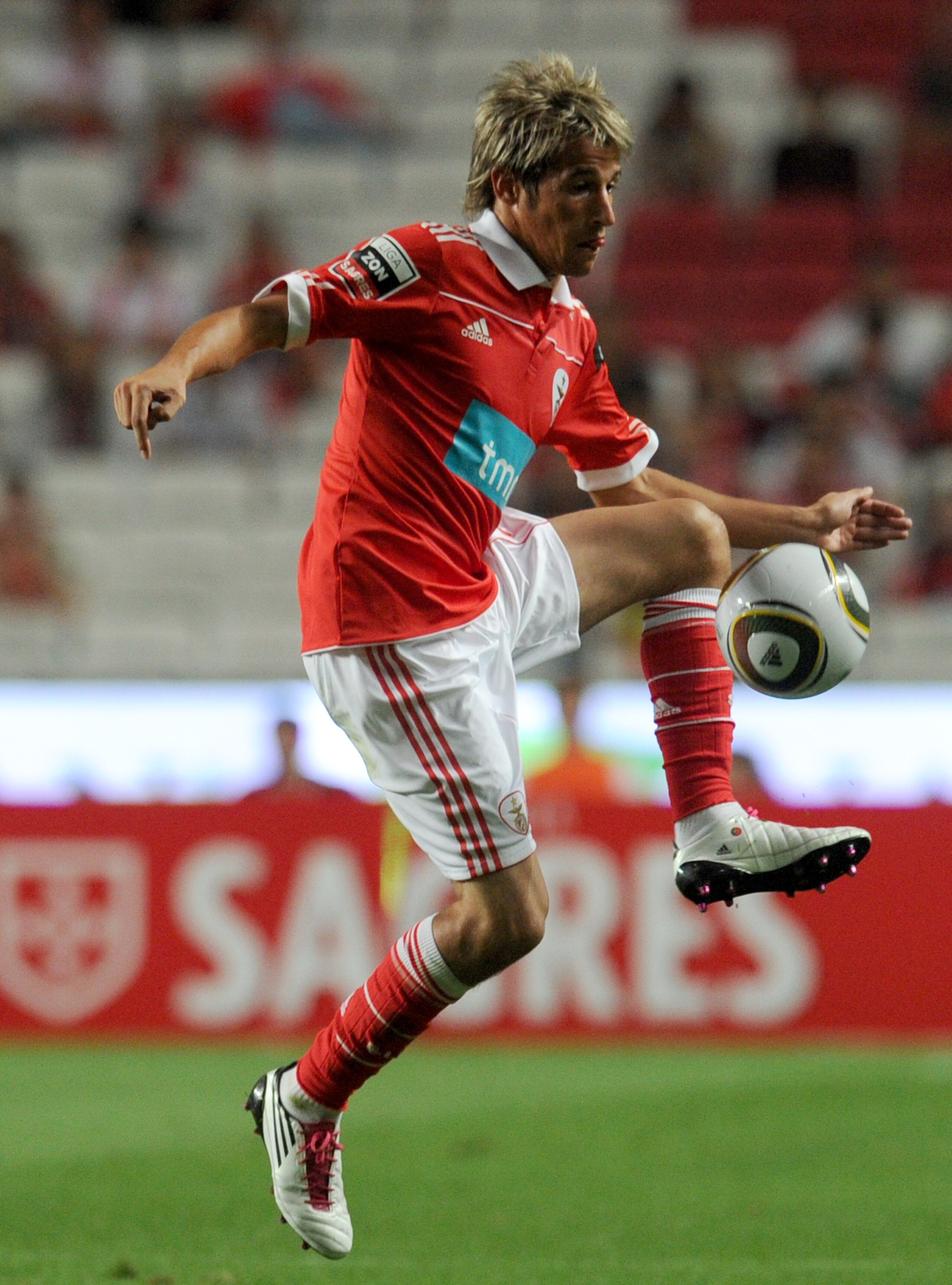LISBON, PORTUGAL - AUGUST 28:  Benfica's midfielder Fabio Coentrao controls the ball during the Portuguese Liga match between Benfica and Vitoria Setubal at Luz Stadium on August 28, 2010 in Lisbon, Portugal.  (Photo by Patricia de Melo/EuroFootball/Getty