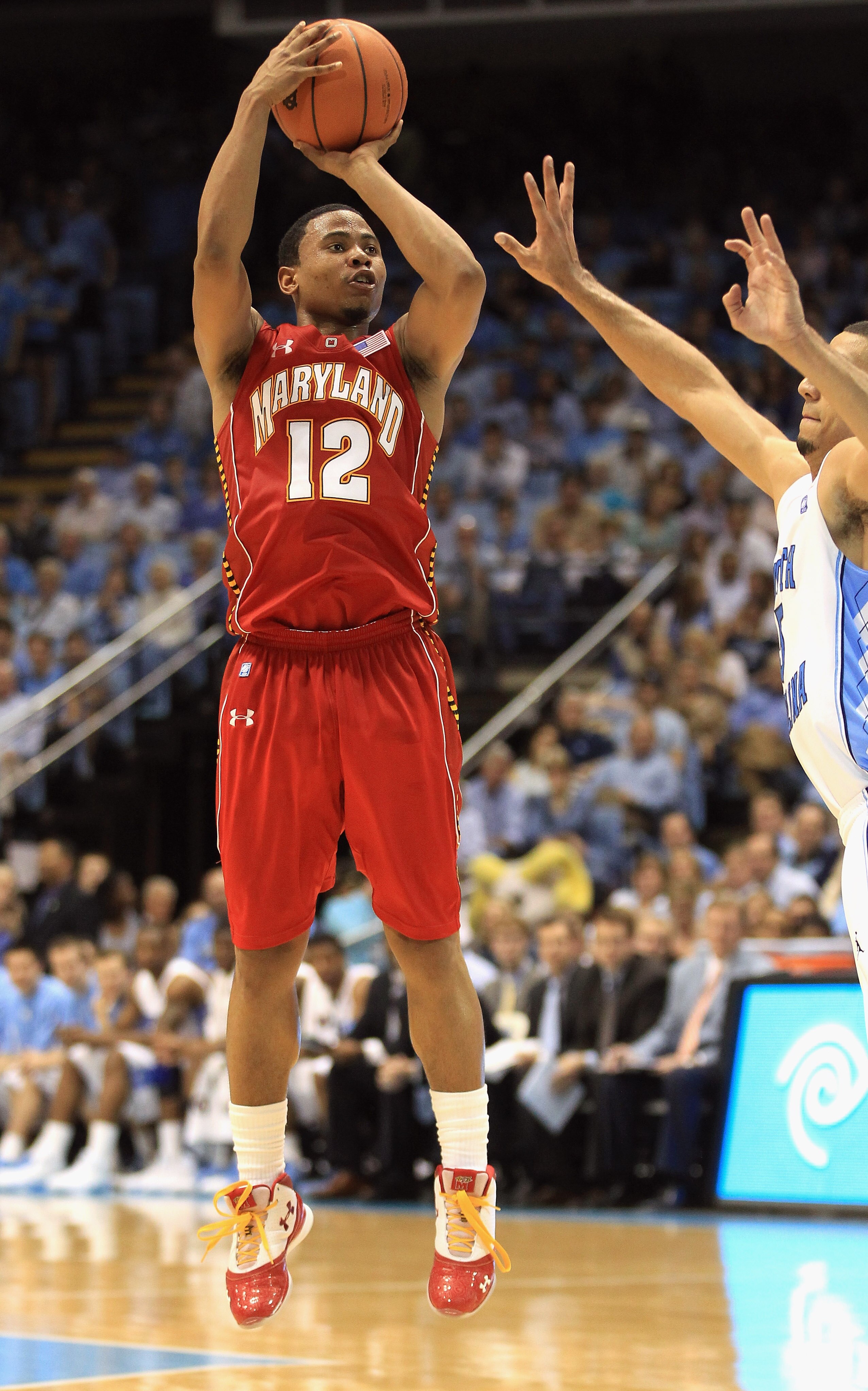 CHAPEL HILL, NC - FEBRUARY 27:  Terrell Stoglin #12 of the Maryland Terrapins shoots the ball over Kendall Marshall #5 of the North Carolina Tar Heels during their game at the Dean E. Smith Center on February 27, 2011 in Chapel Hill, North Carolina.  (Pho