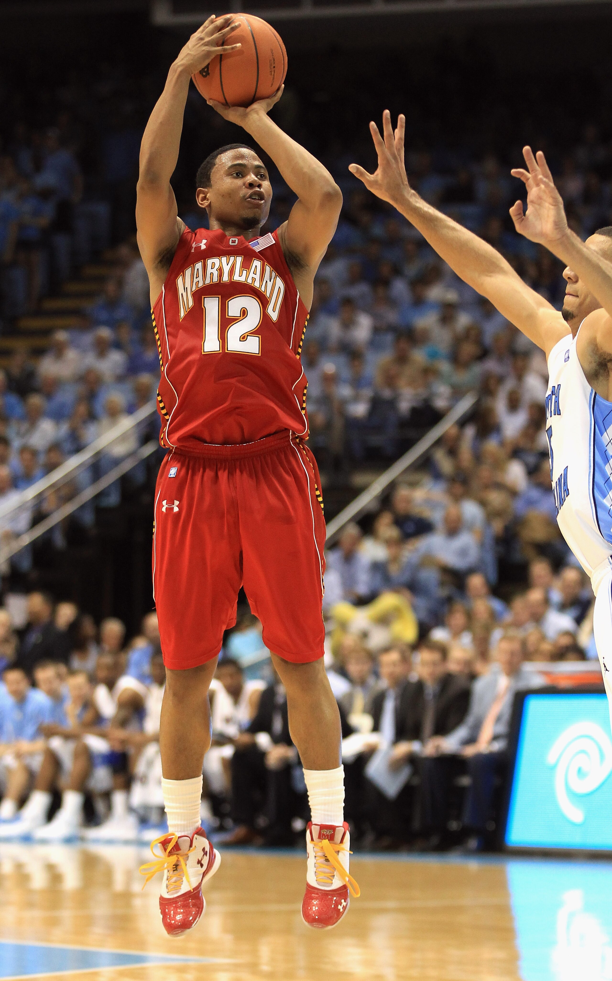 CHAPEL HILL, NC - FEBRUARY 27:  Terrell Stoglin #12 of the Maryland Terrapins shoots the ball over Kendall Marshall #5 of the North Carolina Tar Heels during their game at the Dean E. Smith Center on February 27, 2011 in Chapel Hill, North Carolina.  (Pho