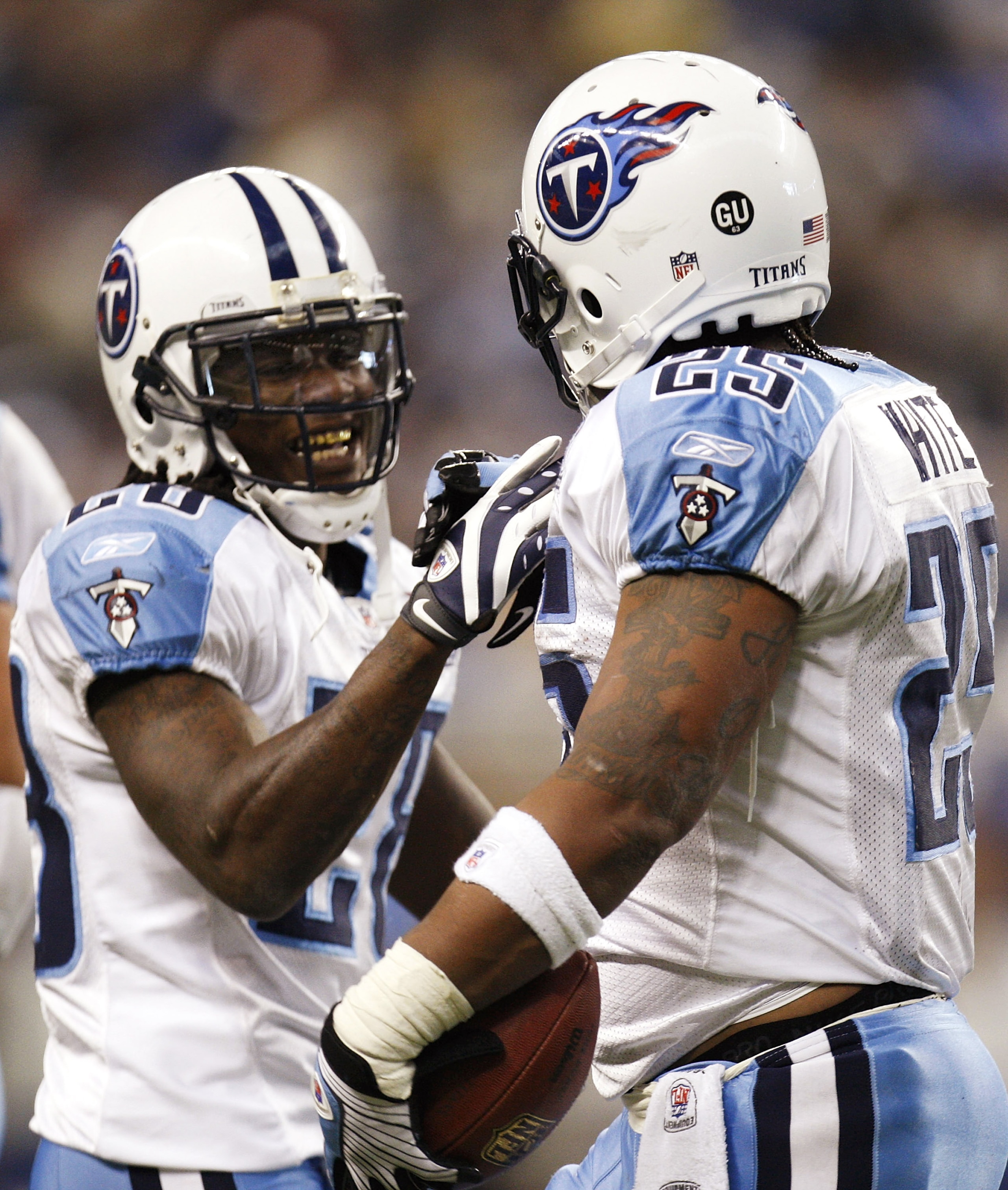 DETROIT , MI - NOVEMBER 27:  LenDale White #25 of the Tennessee Titans celebrates a second quarter touchdown with Chris Johnson #28 while playing the Detroit Lions on November 27, 2008 at Ford Field in Detroit, Michigan.  (Photo by Gregory Shamus/Getty Im