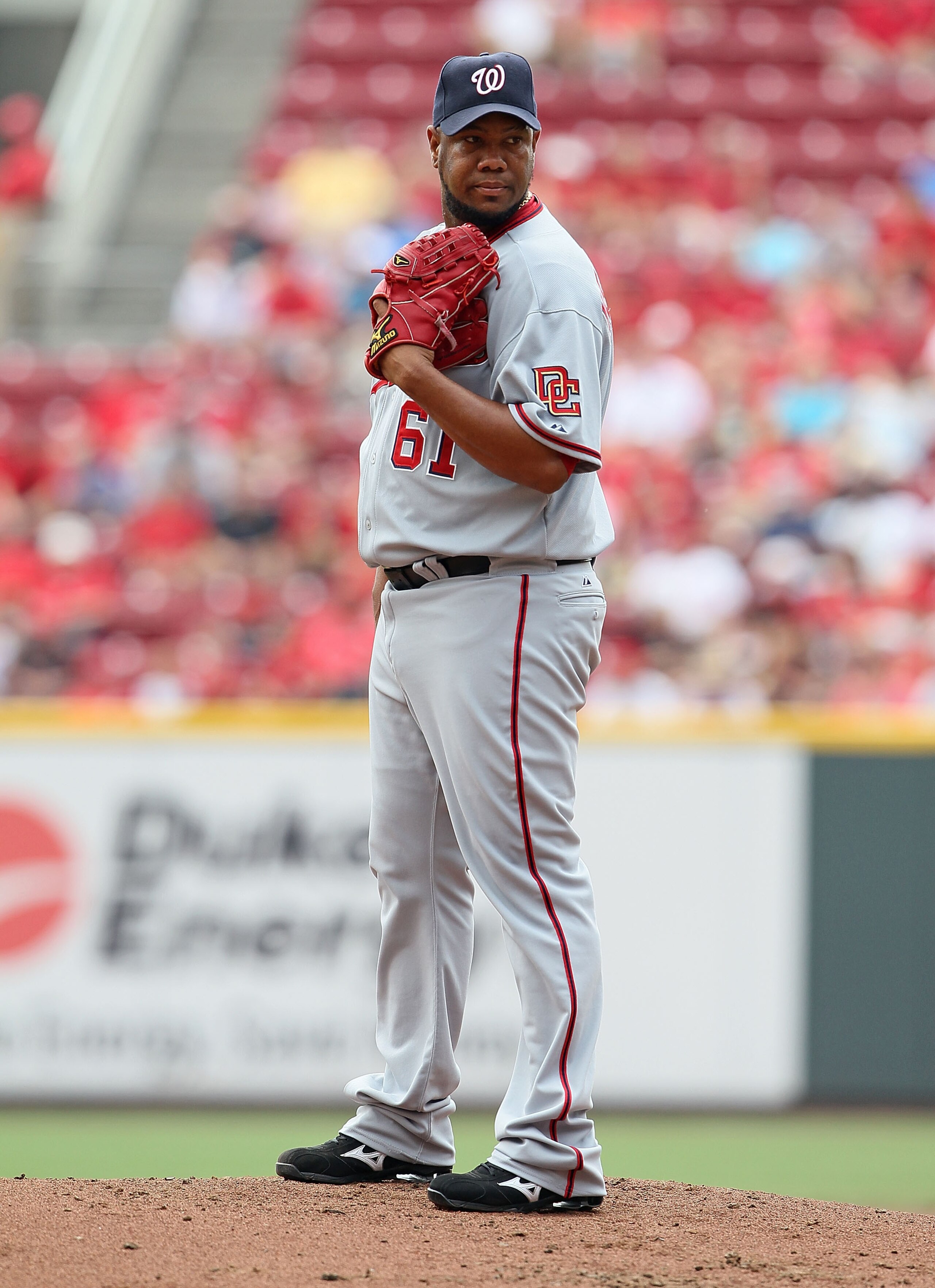 CINCINNATI - JULY 22:  Livan Hernandez #61 of the Washington Nationals throws a pitch during the game against the Cincinnati Reds at Great American Ball Park on July 22, 2010 in Cincinnati, Ohio.  (Photo by Andy Lyons/Getty Images)
