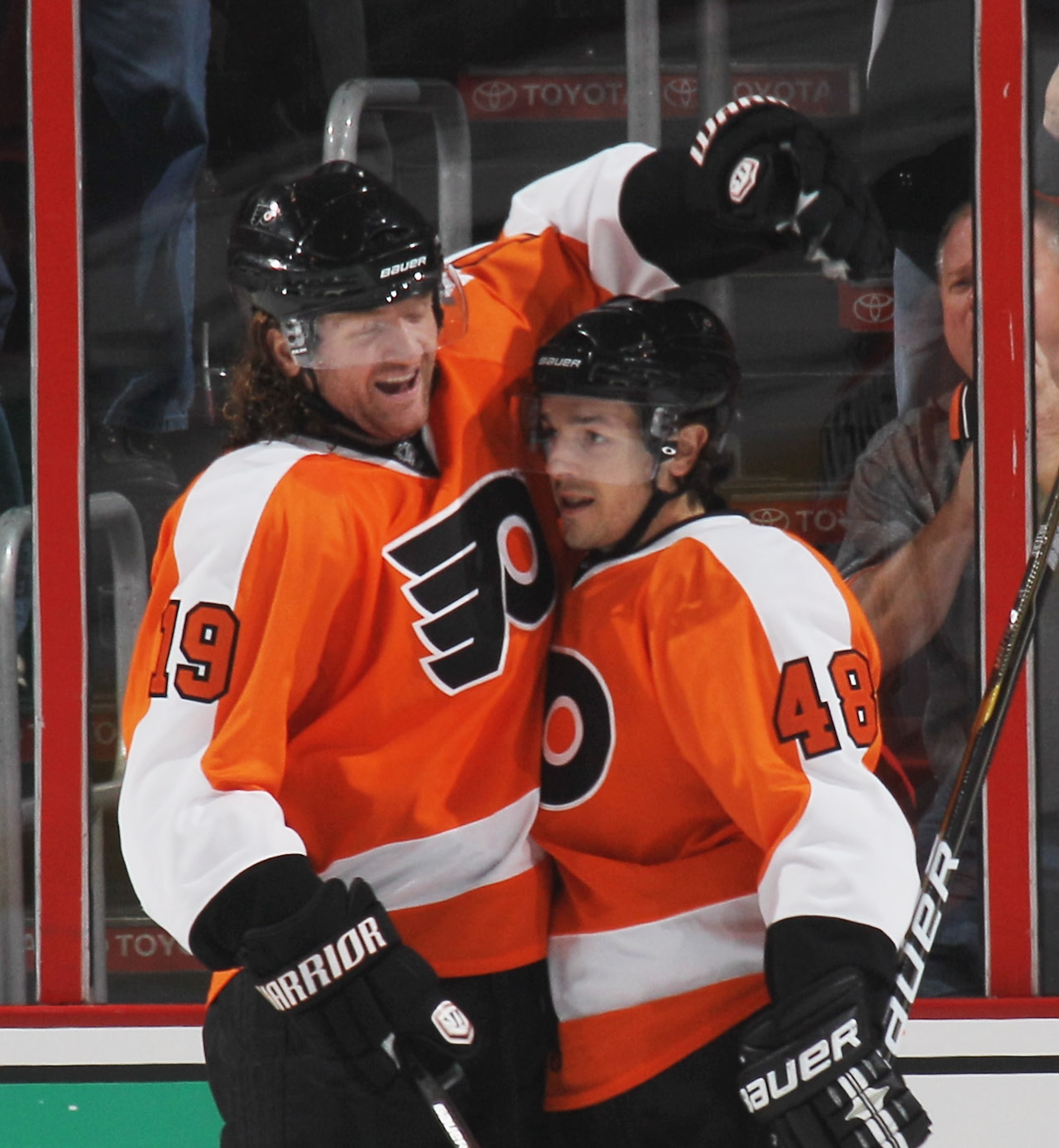 PHILADELPHIA - OCTOBER 16: Danny Briere #48 (R) of the Philadelphia Flyers scores a power play goal at 6:43 of the first period against the Pittsburgh Penguins and is joined by Scott Hartnell #19 (L) at the Wells Fargo Center on October 16, 2010 in Philad