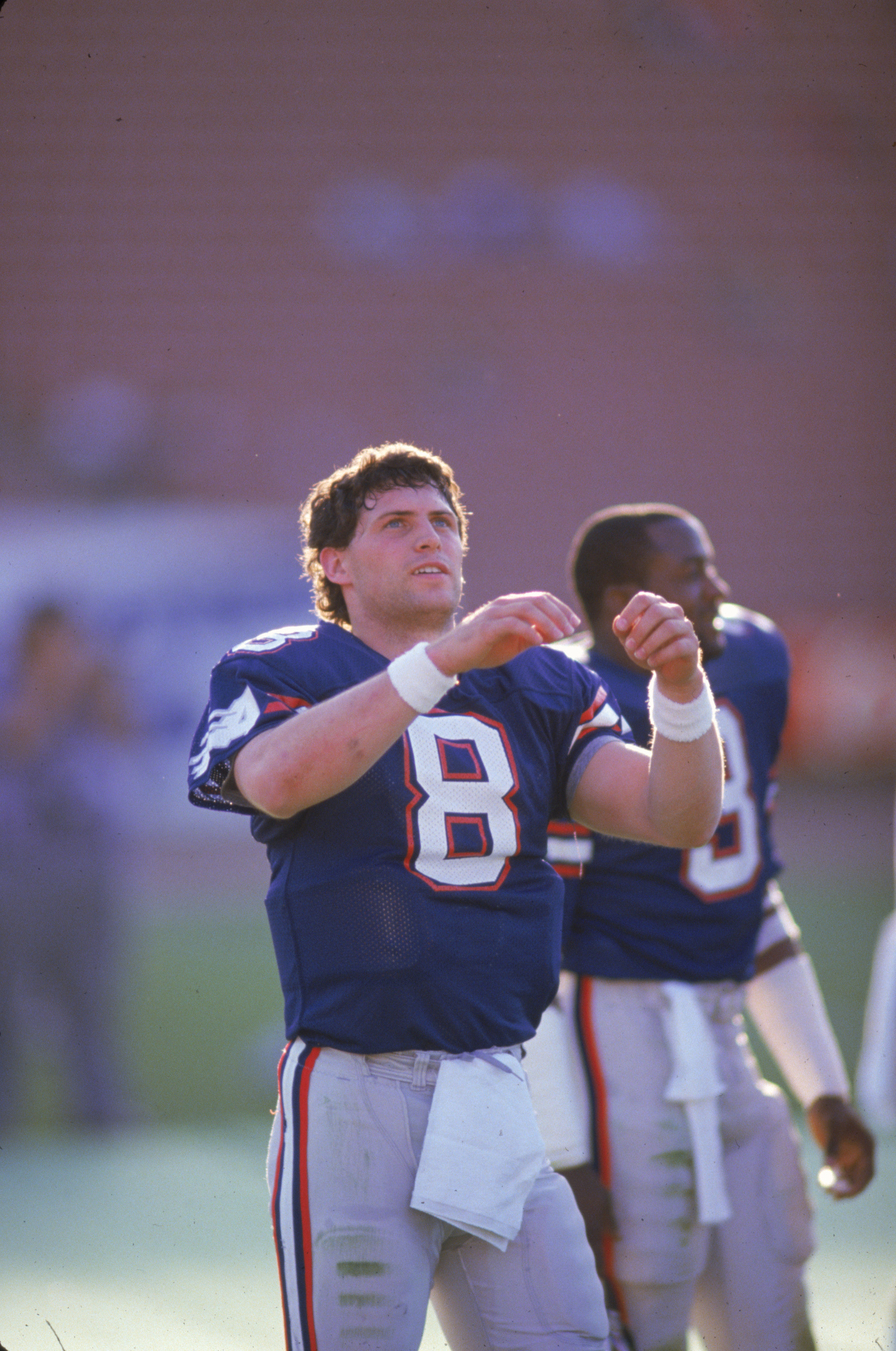 1985:  Quarterback Steve Young #8 of the USFL's Los Angeles Express warms up on the field prior to a 1985 season game. (Photo by Getty Images)