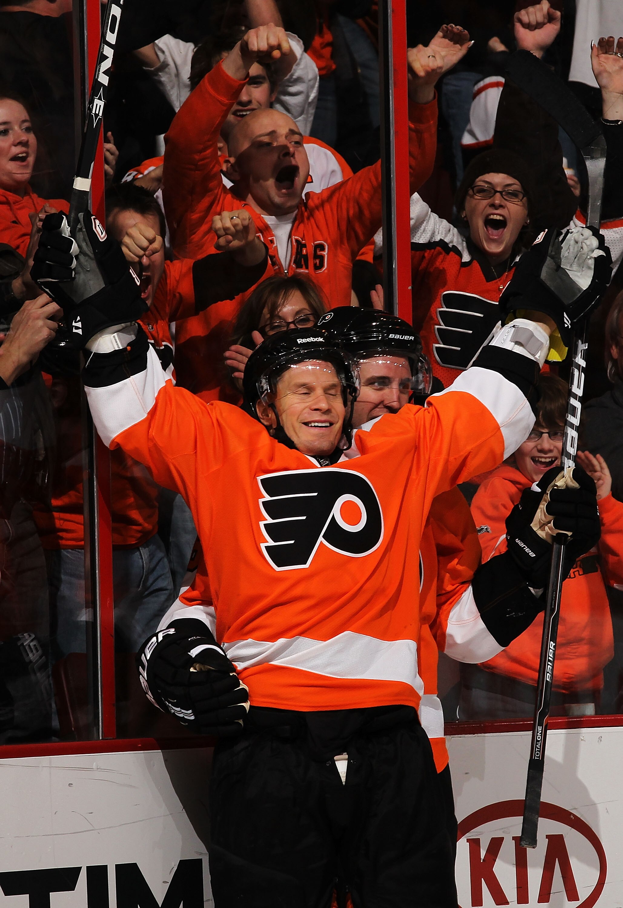 PHILADELPHIA - MARCH 05:  Kimmo Timonen #44  of The Philadelphia Flyers celebrates his short handed goal with Mike Richards #18 against The Buffalo sabres during their game on March 5, 2011 at The Wells Fargo Center in Philadelphia, Pennsylvania.  (Photo 