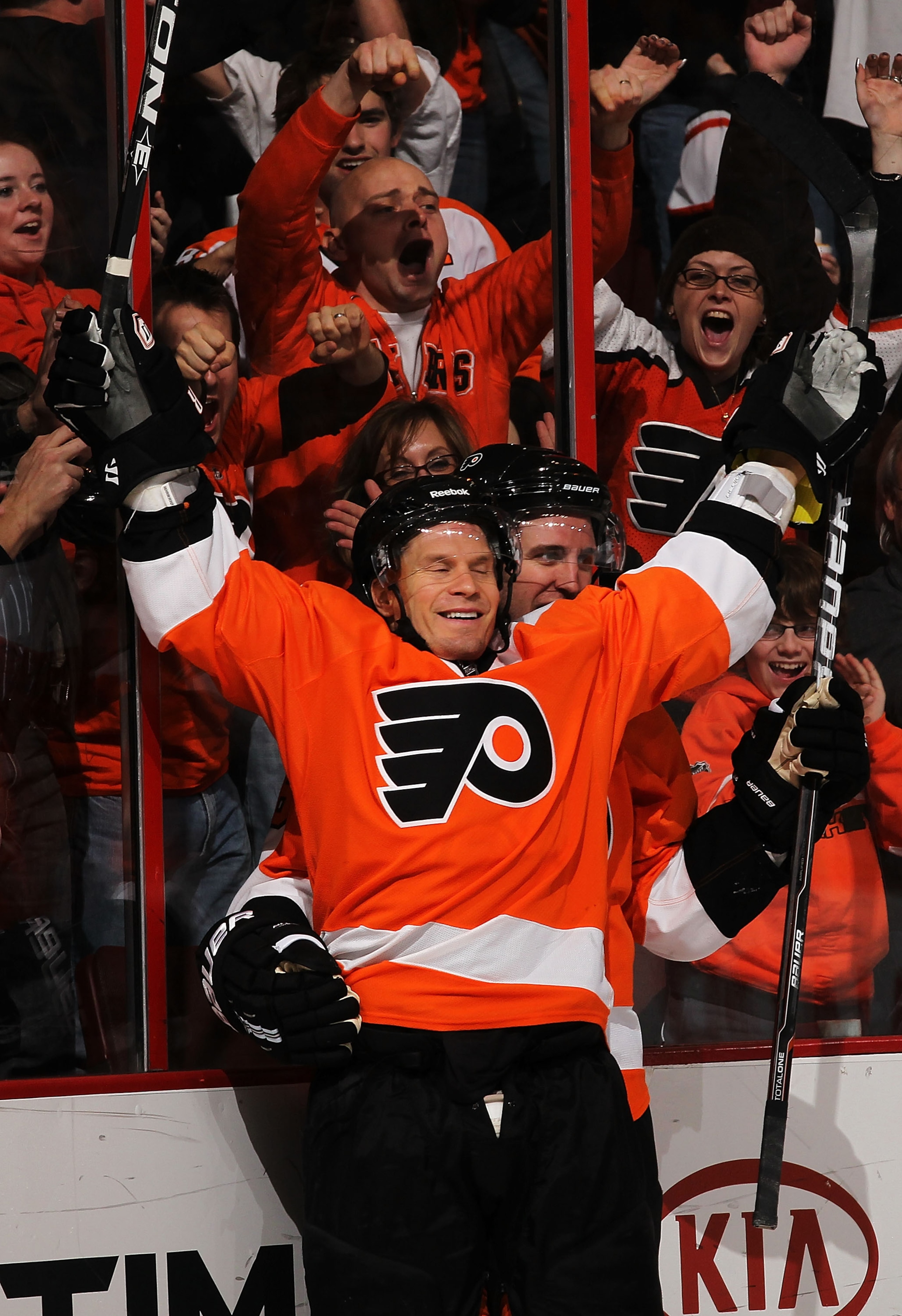 PHILADELPHIA - MARCH 05:  Kimmo Timonen #44  of The Philadelphia Flyers celebrates his short handed goal with Mike Richards #18 against The Buffalo sabres during their game on March 5, 2011 at The Wells Fargo Center in Philadelphia, Pennsylvania.  (Photo 