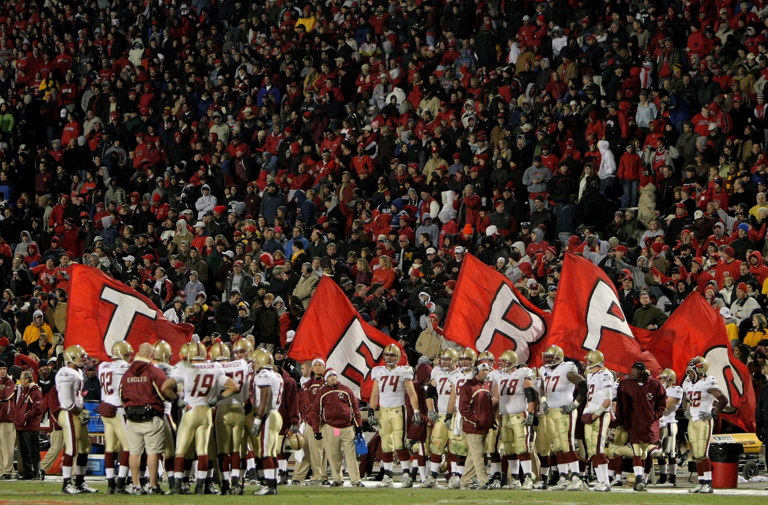 COLLEGE PARK, MD - NOVEMBER 10:  Maryland Terrapins cheerleaders parade the Terps flags behind the Boston College Eagles bench as Maryland defeated Boston College 42-35 at Byrd Stadium on November 10, 2007 in College Park, Maryland.  (Photo by Doug Pensin