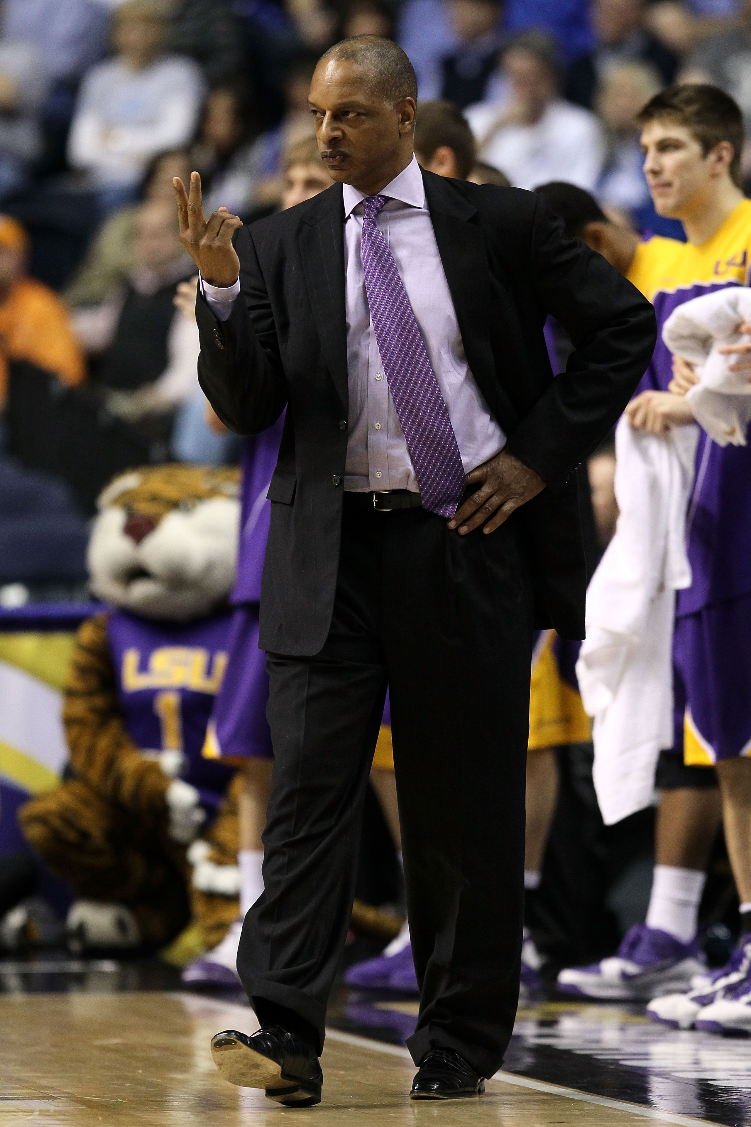 NASHVILLE, TN - MARCH 11:  Head coach Trent Johnson of the LSU Tigers coaches against the Tennessee Volunteers during the first round of the SEC Men's Basketball Tournament at the Bridgestone Arena on March 11, 2010 in Nashville, Tennessee.  (Photo by And