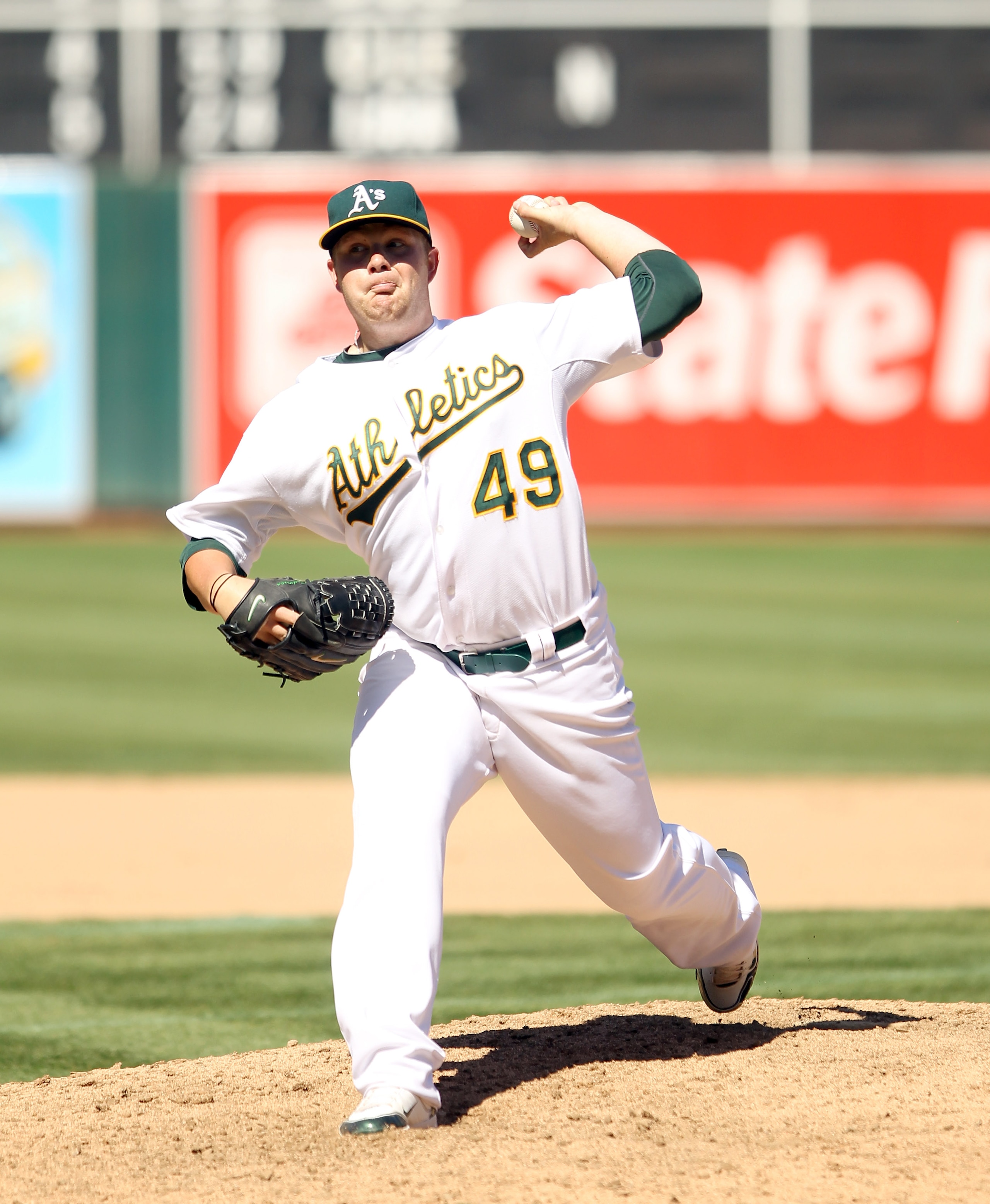 OAKLAND, CA - SEPTEMBER 06:  Brett Anderson #49 of the Oakland Athletics pitches against the Seattle Mariners at the Oakland-Alameda County Coliseum on September 6, 2010 in Oakland, California.  (Photo by Ezra Shaw/Getty Images)