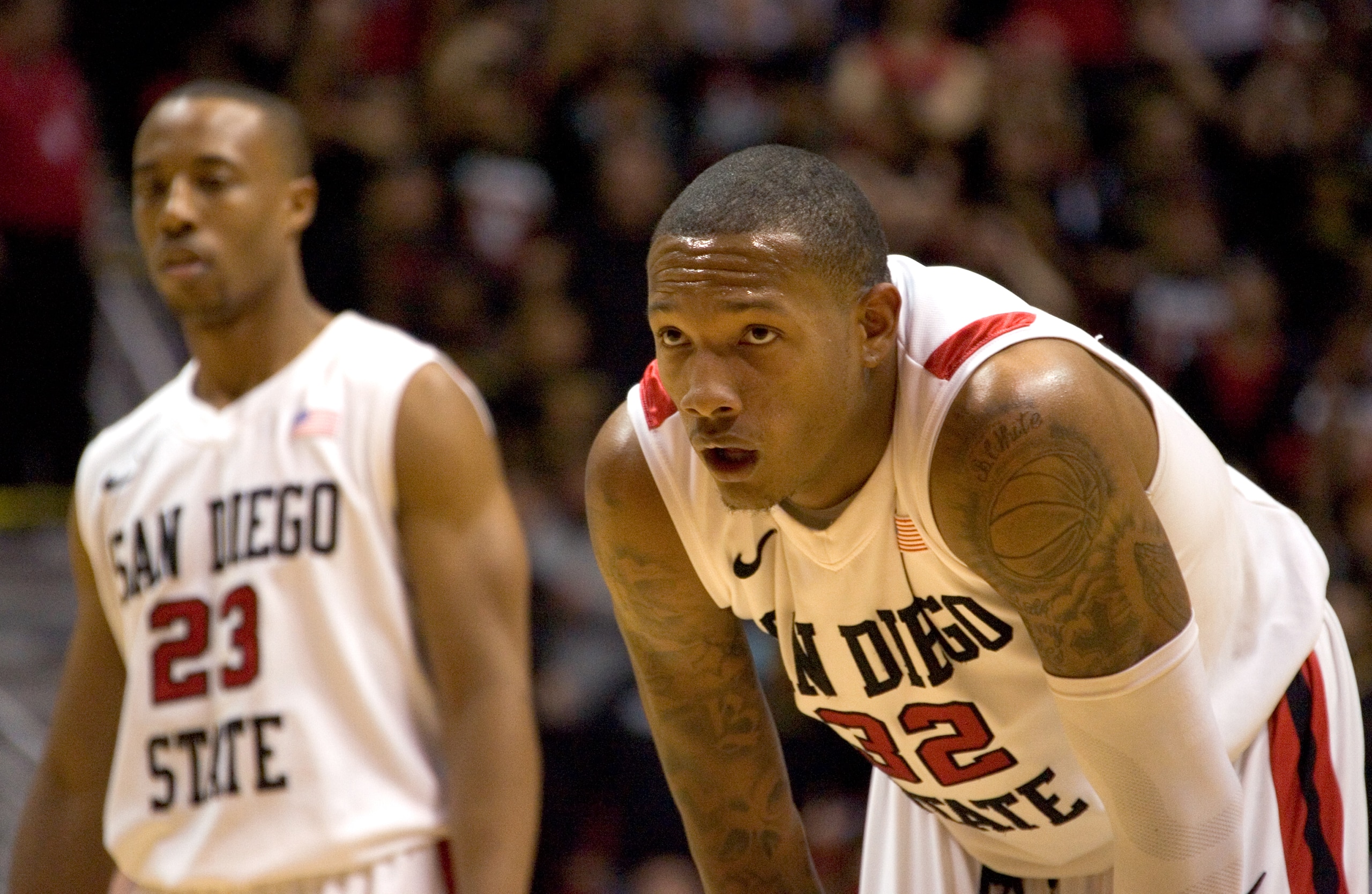 SAN DIEGO, CA - FEBRUARY 26:  Billy White #32 and D.J. Gay #23 of the San Diego State Aztecs catch their breath during the second half against Brigham Young Cougars at Cox Arena on February 26, 2011 in San Diego, California. BYU beat SDSU 80-67. (Photo by