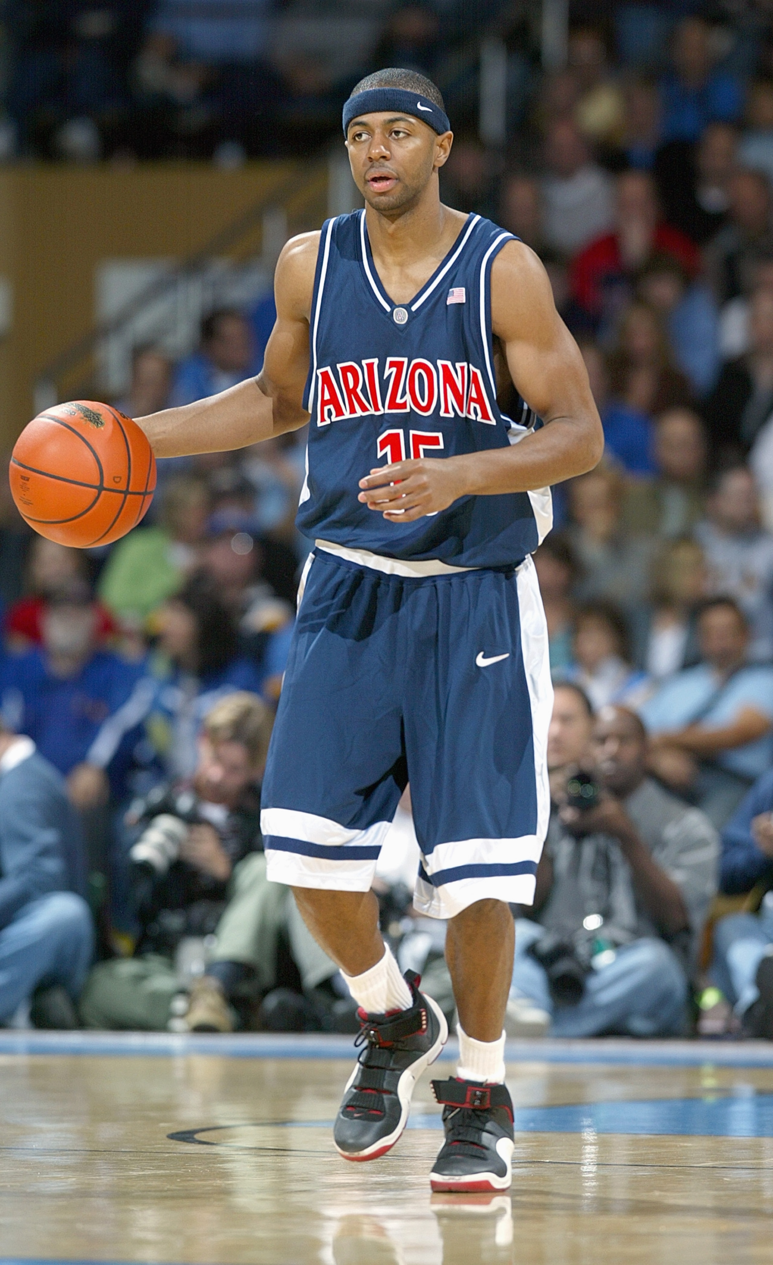 LOS ANGELES, CA - JANUARY 20: Mustafa Shakur #15 of the Arizona Wildcats dribbles the ball downcourt against the UCLA Bruins at Pauley Pavilion during the game on January 20, 2007 in Los Angeles, California. UCLA defeated Arizona 73-69. (Photo by Jeff Gro