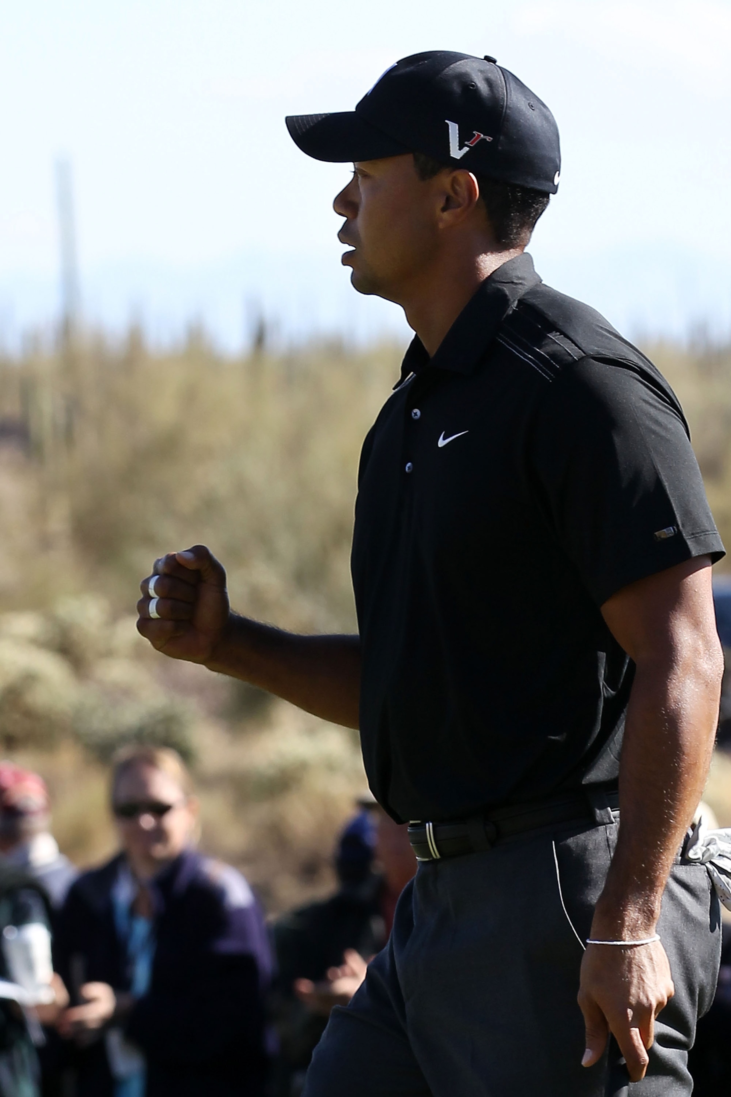 MARANA, AZ - FEBRUARY 23:  Tiger Woods reacts during the first round of the Accenture Match Play Championship at the Ritz-Carlton Golf Club on February 23, 2011 in Marana, Arizona.  (Photo by Sam Greenwood/Getty Images)