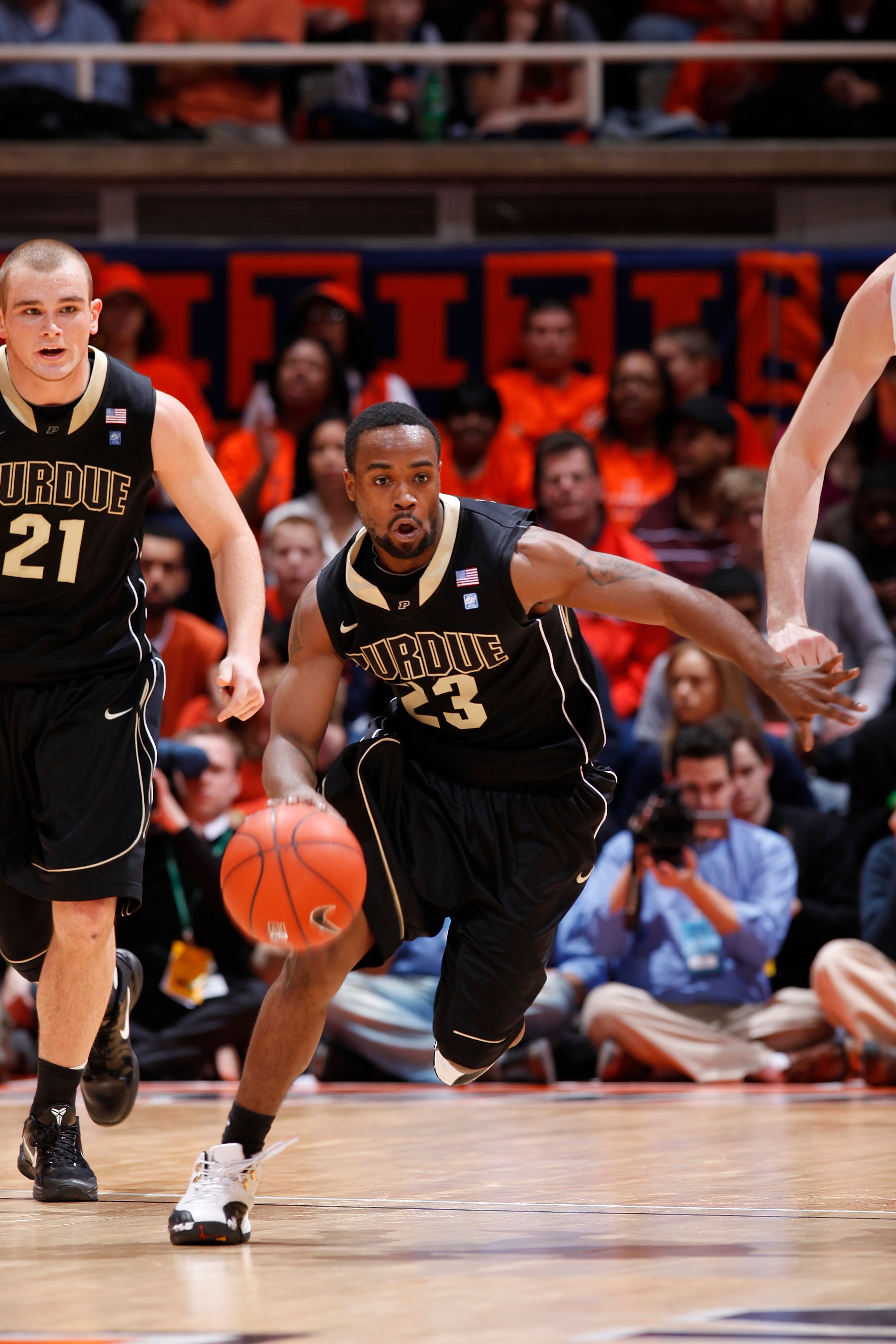 CHAMPAIGN, IL - FEBRUARY 13: Lewis Jackson #23 of the Purdue Boilermakers leads a fast break against the Illinois Fighting Illini at Assembly Hall on February 13, 2011 in Champaign, Illinois. Purdue defeated Illinois 81-70. (Photo by Joe Robbins/Getty Ima