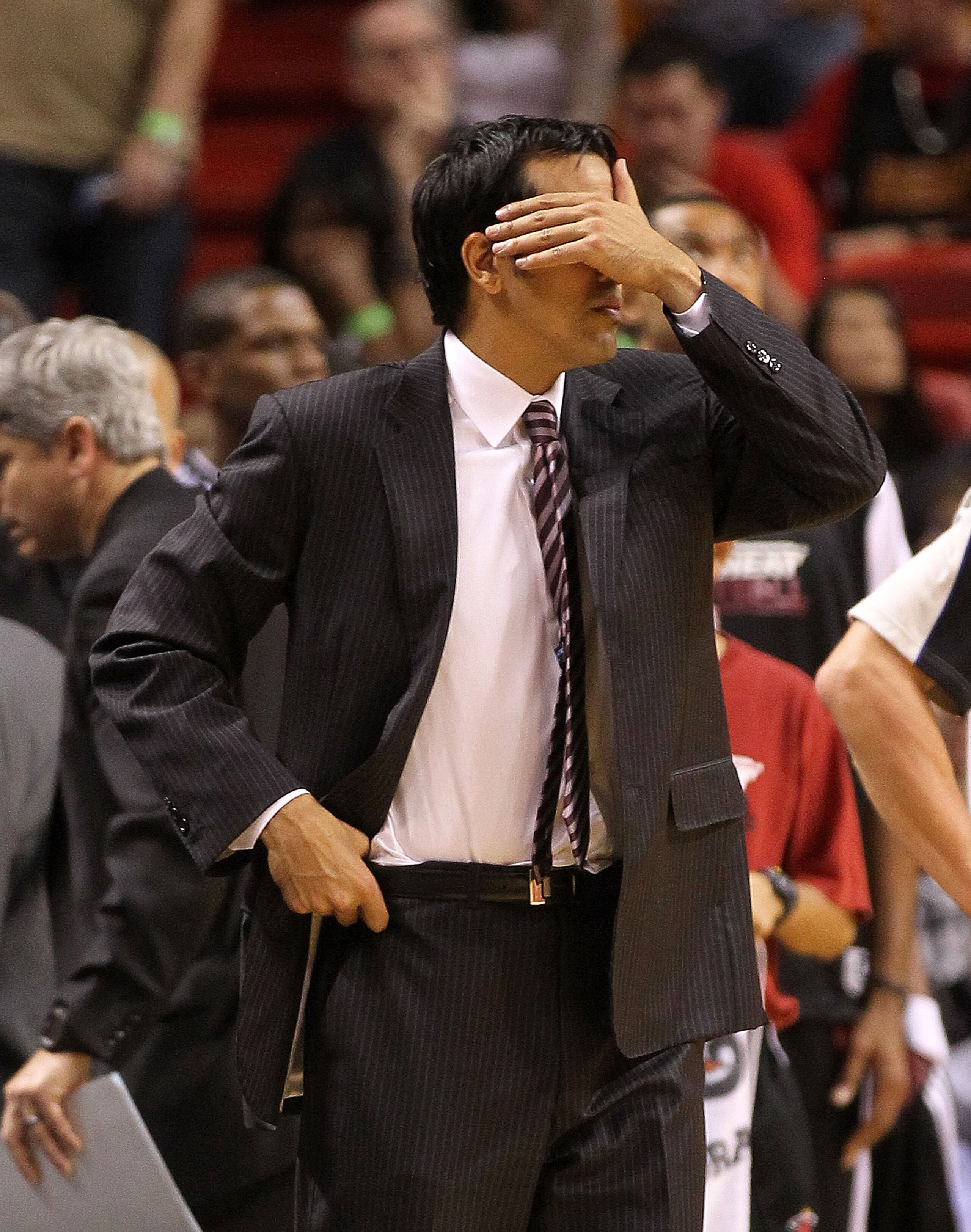 MIAMI, FL - MARCH 08:  Miami Heat head coach Erik Spoelstra reacts after losing a game against the Portland Trail Blazers at American Airlines Arena on March 8, 2011 in Miami, Florida. NOTE TO USER: User expressly acknowledges and agrees that, by download