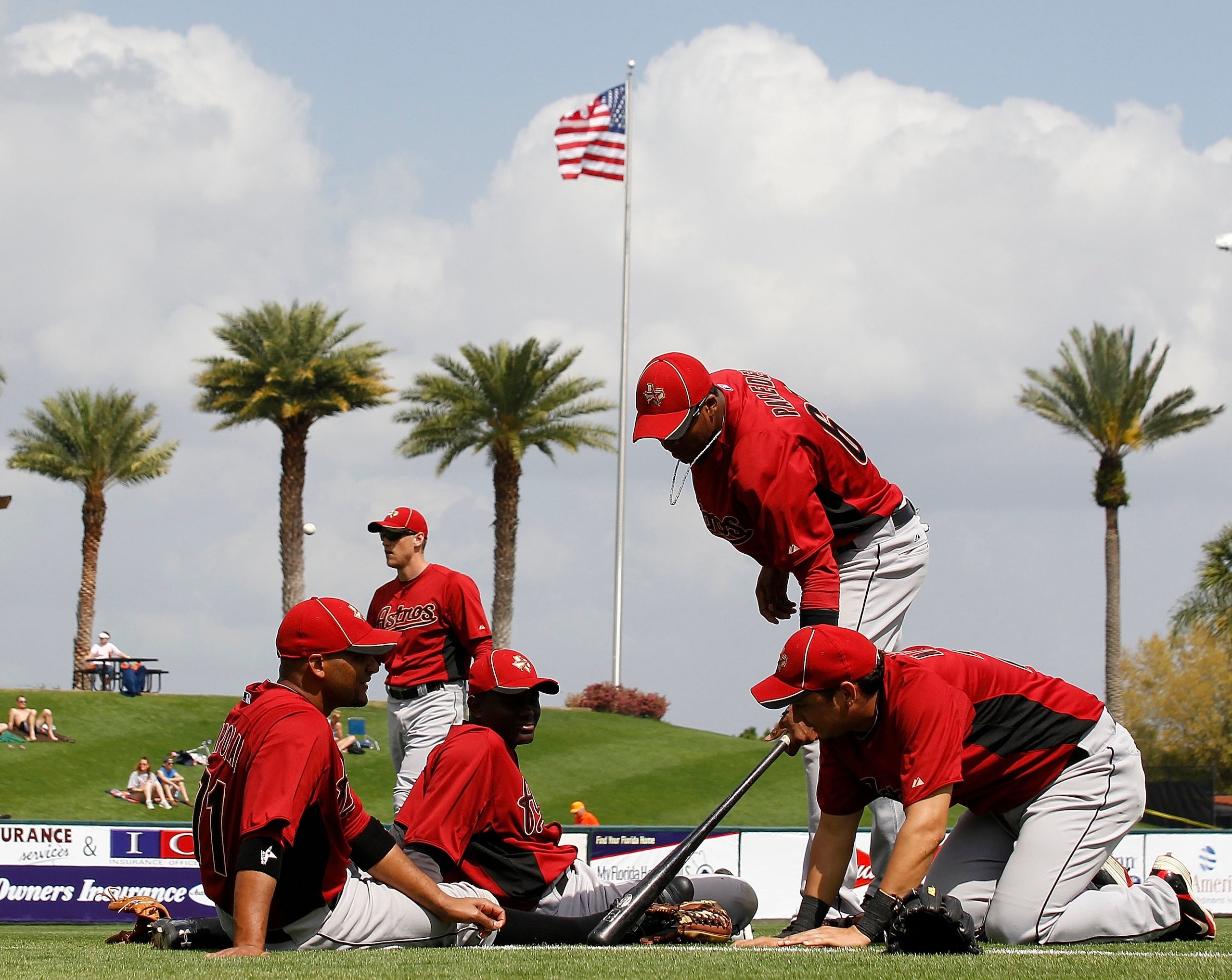 LAKELAND, FL - MARCH 02: (L-R) Carlos Corporan #71 Jose Monzon #98 Jimmy Paredes #69 and Oswaldo Navarro #26 of the Houston Astros warm up prior to the start of the game against the Detroit Tigers at Joker Marchant Stadium on March 2, 2011 in Lakeland, Fl