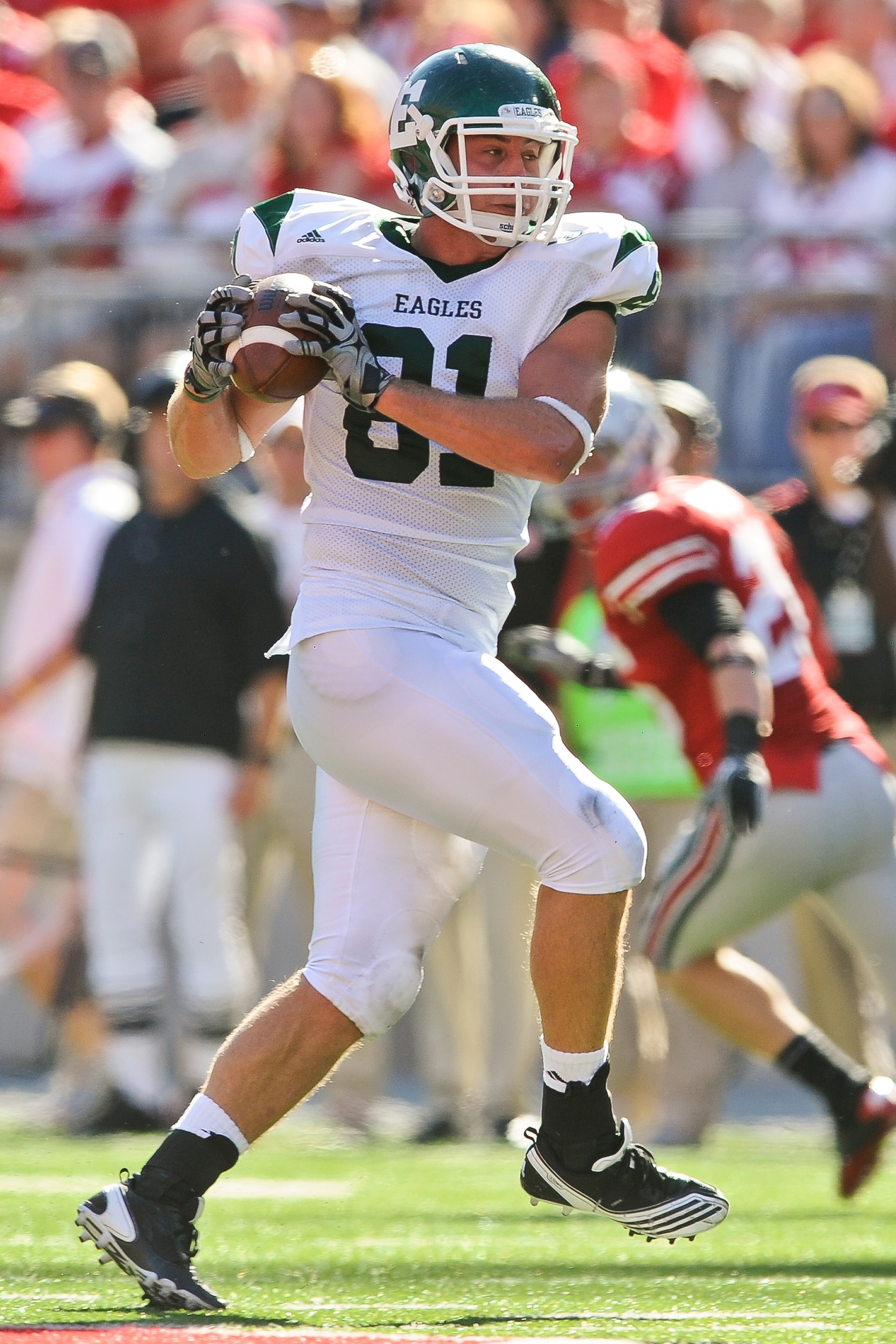 COLUMBUS, OH - SEPTEMBER 25:  Ben Thayer #81 of the Eastern Michigan Eagles runs with the ball against the Ohio State Buckeyes at Ohio Stadium on September 25, 2010 in Columbus, Ohio.  Ohio State won 73-20. (Photo by Jamie Sabau/Getty Images)