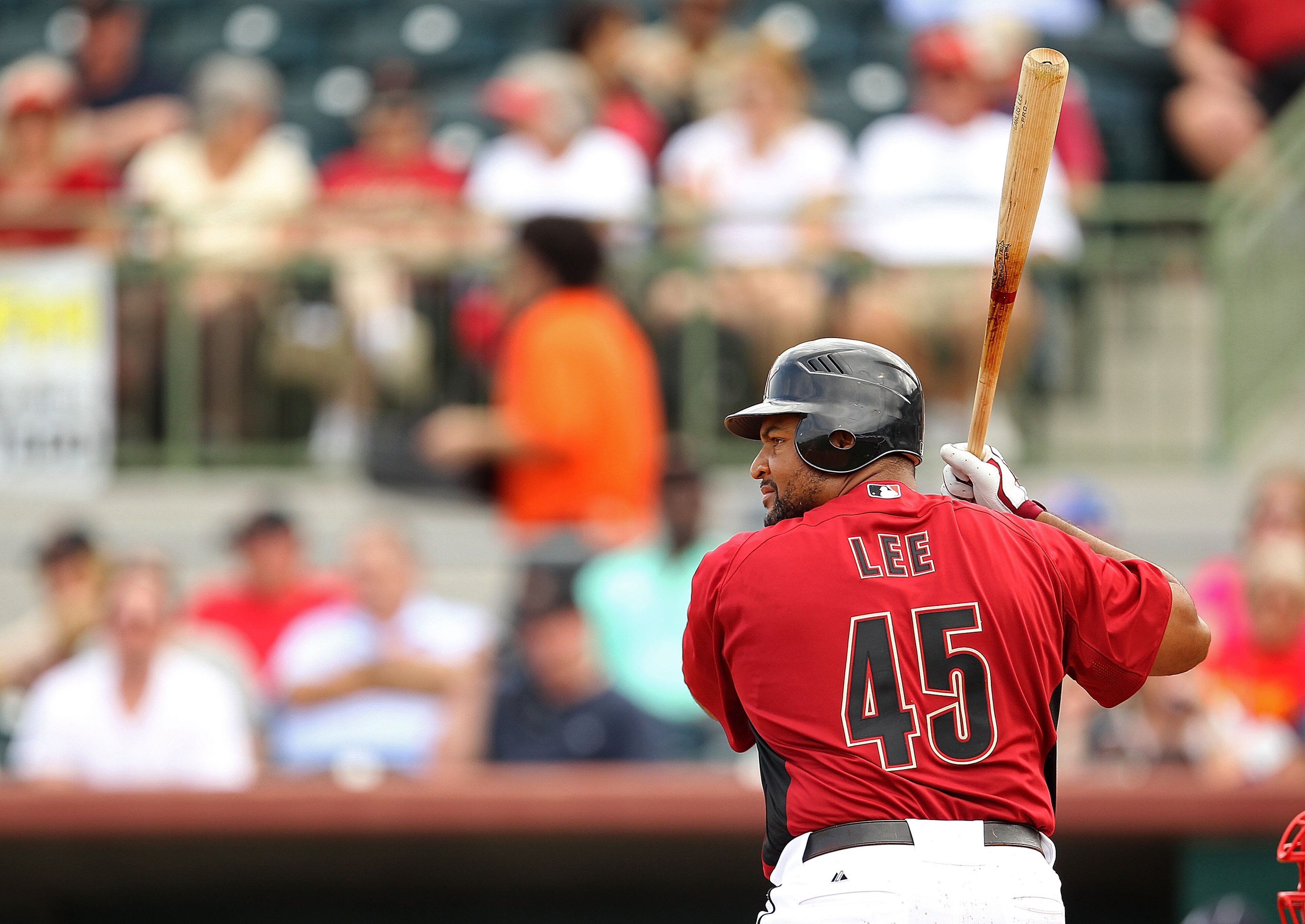 KISSIMMEE, FL - MARCH 01: Carlos Lee #45 of the Houston Astros bats during a Spring Training game against the Atlanta Braves at Osceola County Stadium on March 1, 2011 in Kissimmee, Florida. (Photo by Mike Ehrmann/Getty Images) KISSIMMEE, FL - MARCH 01: Carlos Lee #45 of the Houston Astros bats during a Spring Training game against the Atlanta Braves at Osceola County Stadium on March 1, 2011 in Kissimmee, Florida. (Photo by Mike Ehrmann/Getty Images)