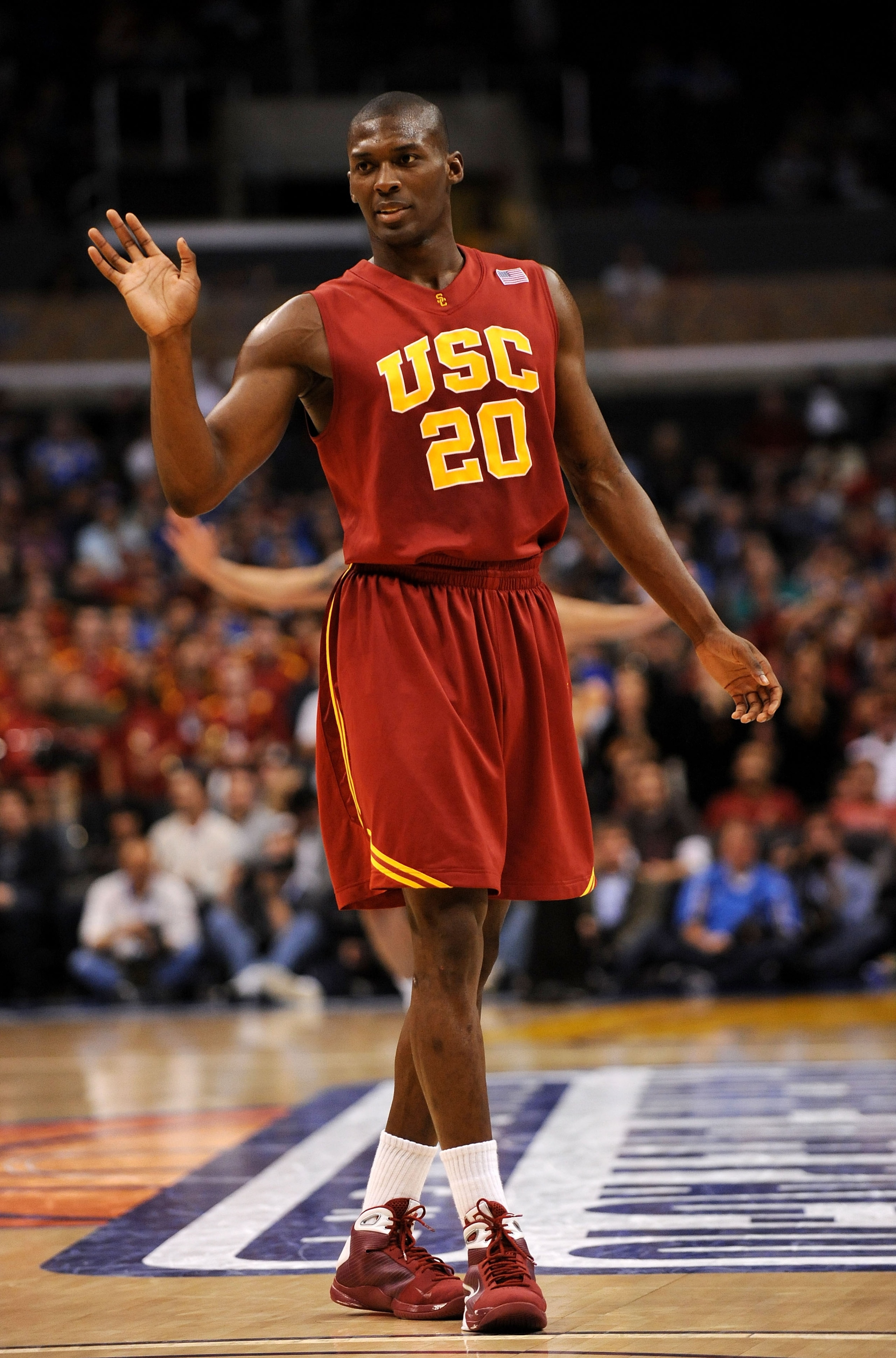 LOS ANGELES, CA - MARCH 13:  Guard Marcus Simmons #20 of the USC Trojans stands on the court during their game against the UCLA Bruins in the Pacific Life Pac-10 Men's Basketball Tournament at the Staples Center on March 13, 2009 in Los Angeles, Californi